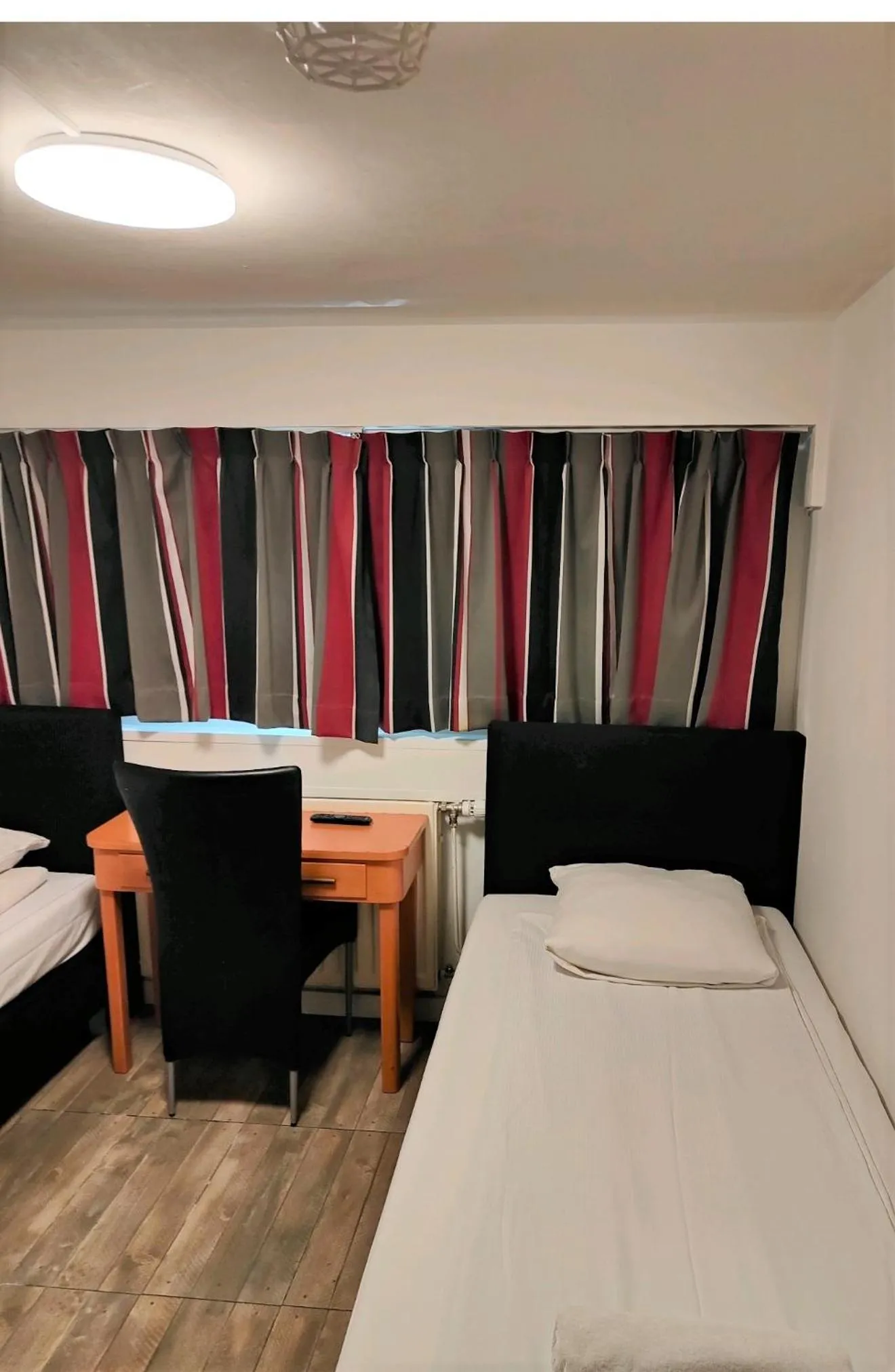 Bedroom in Hotel Holland Lodge