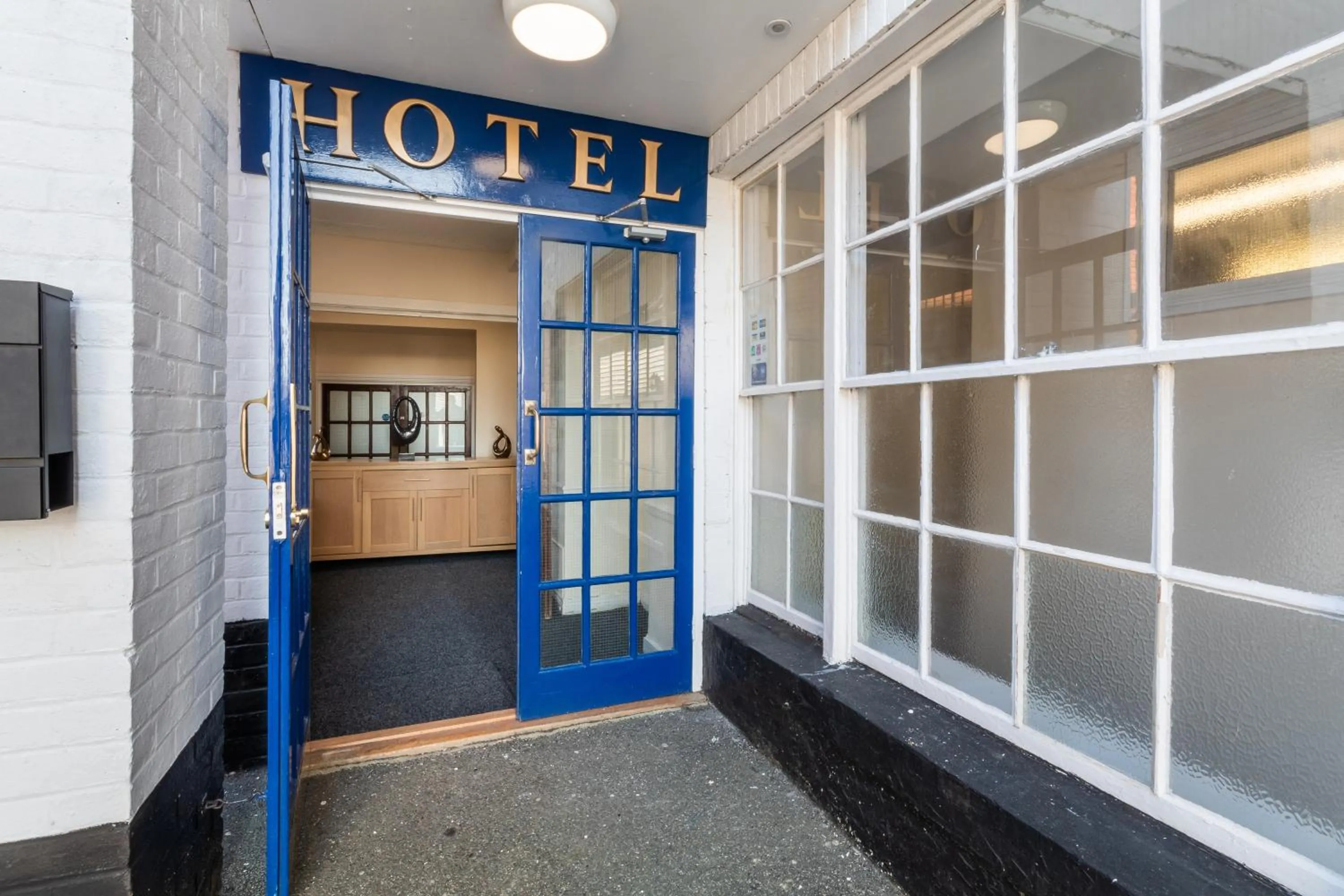 Property logo or sign in The George Hotel