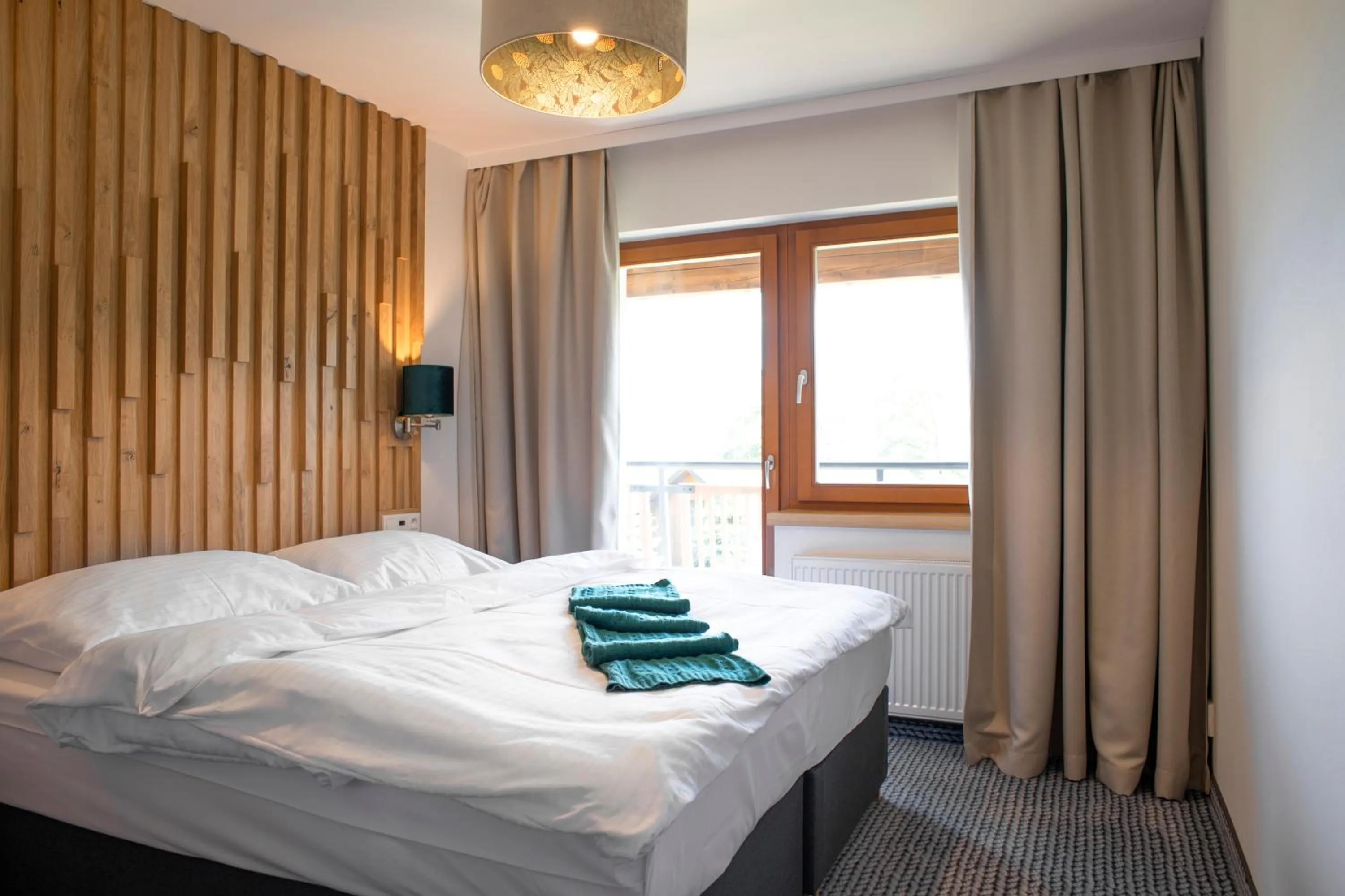 Bedroom, Bed in Amenity Hotel & Resort Lipno