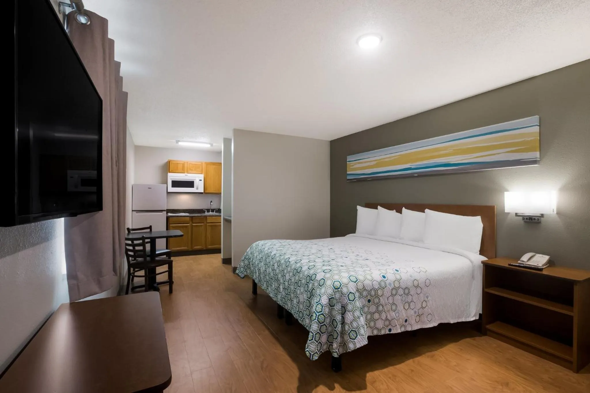 Bedroom, Bed in HomeTowne Studios by Red Roof Covington, GA