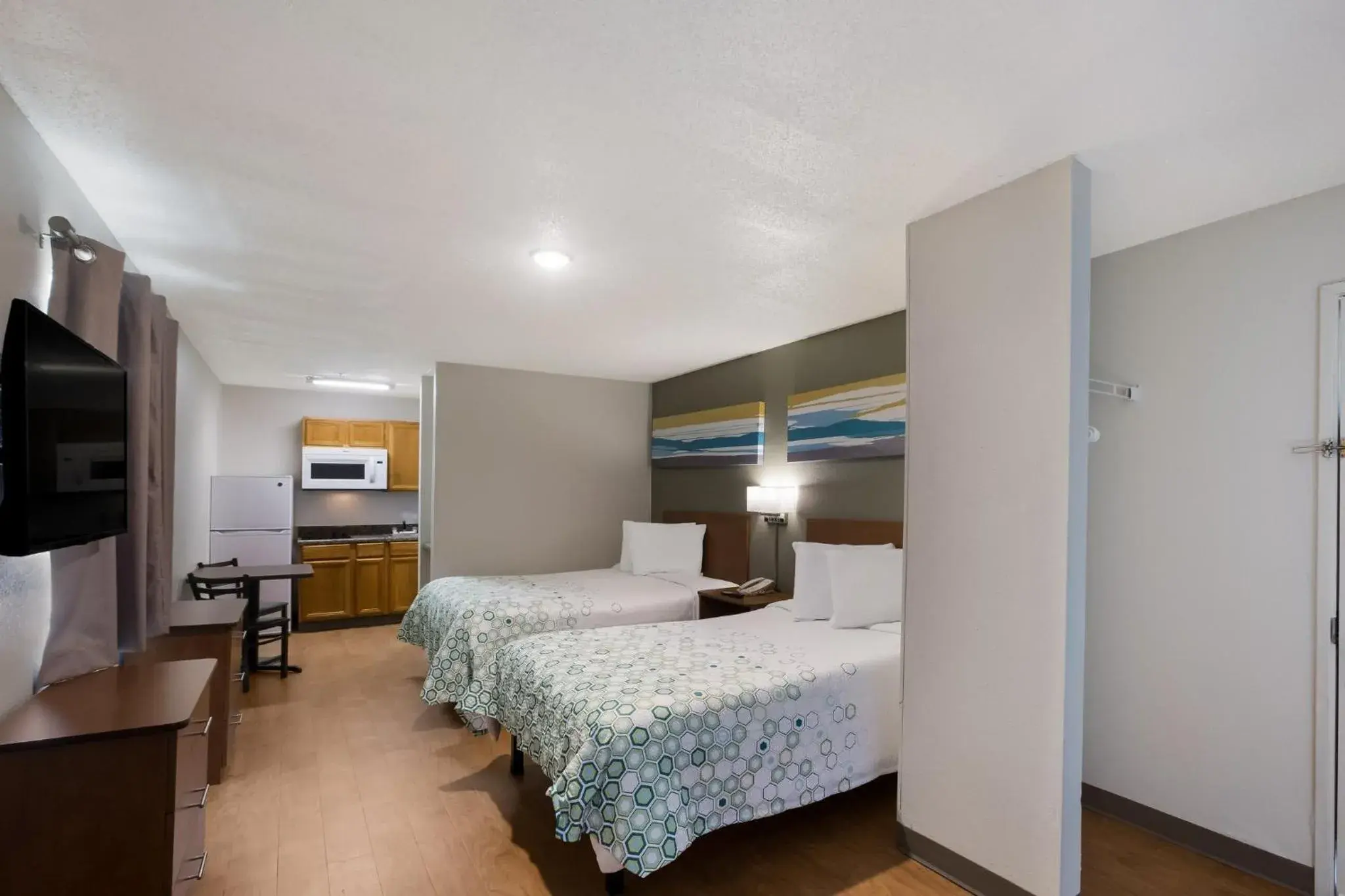 Photo of the whole room, Bed in HomeTowne Studios by Red Roof Covington, GA Photo of the whole room, Bed in HomeTowne Studios by Red Roof Covington, GA