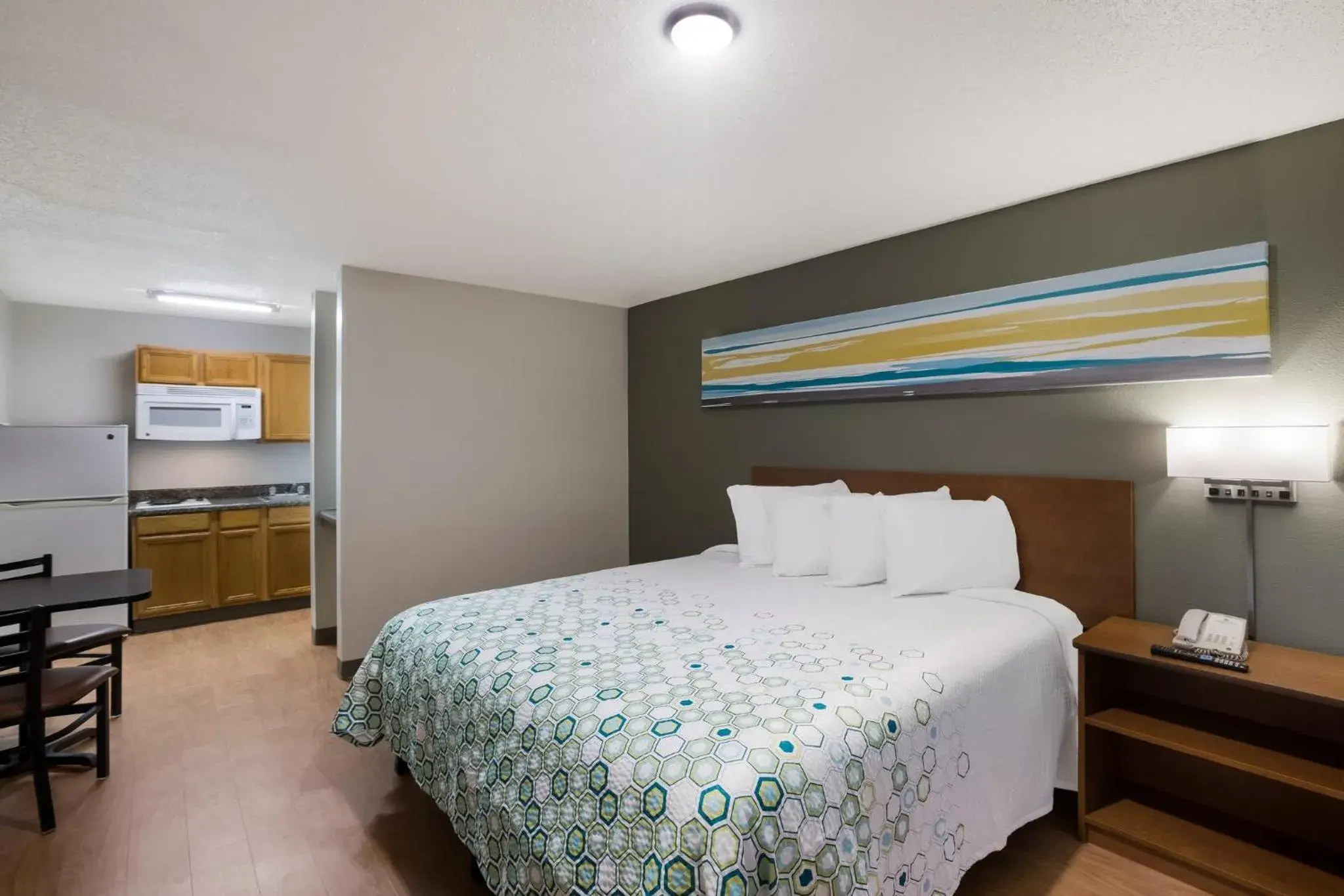 Bedroom, Bed in HomeTowne Studios by Red Roof Covington, GA Bedroom, Bed in HomeTowne Studios by Red Roof Covington, GA