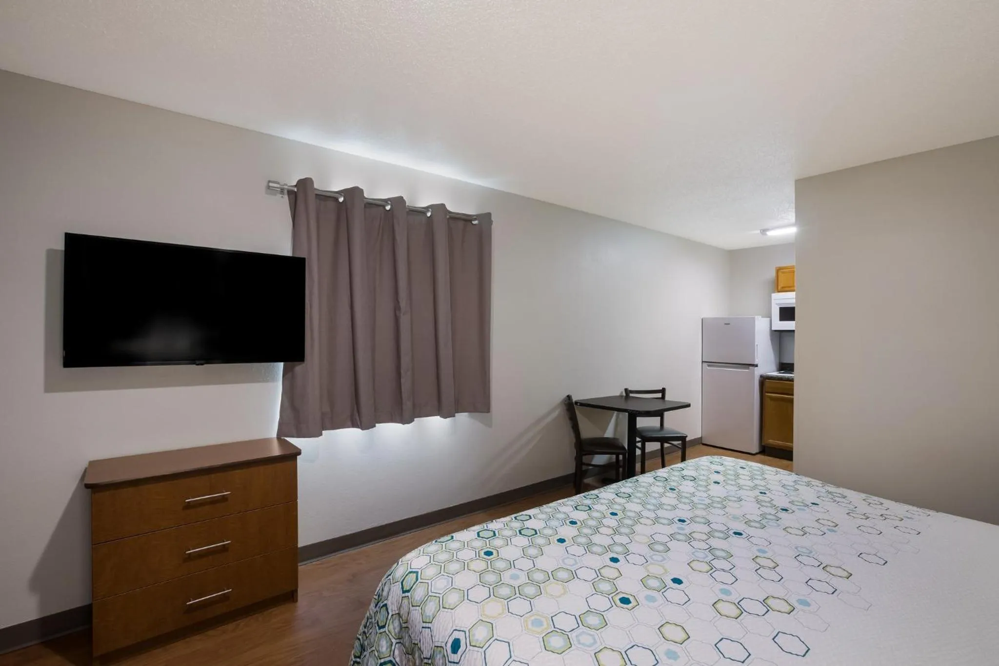 Bedroom, Bed in HomeTowne Studios by Red Roof Covington, GA