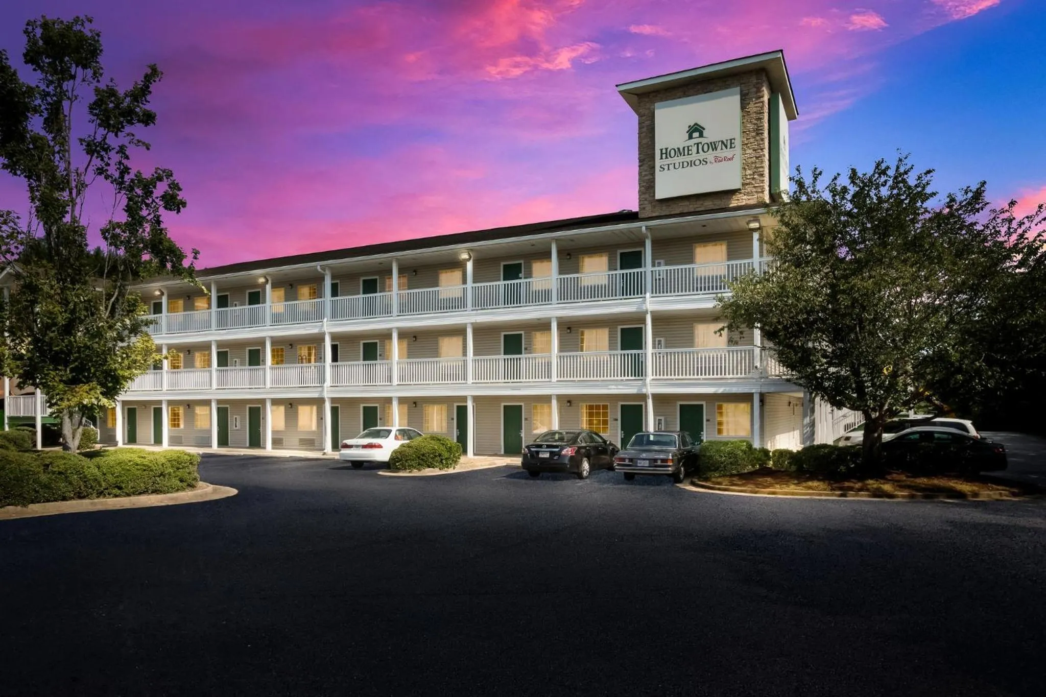 Property building in HomeTowne Studios by Red Roof Covington, GA