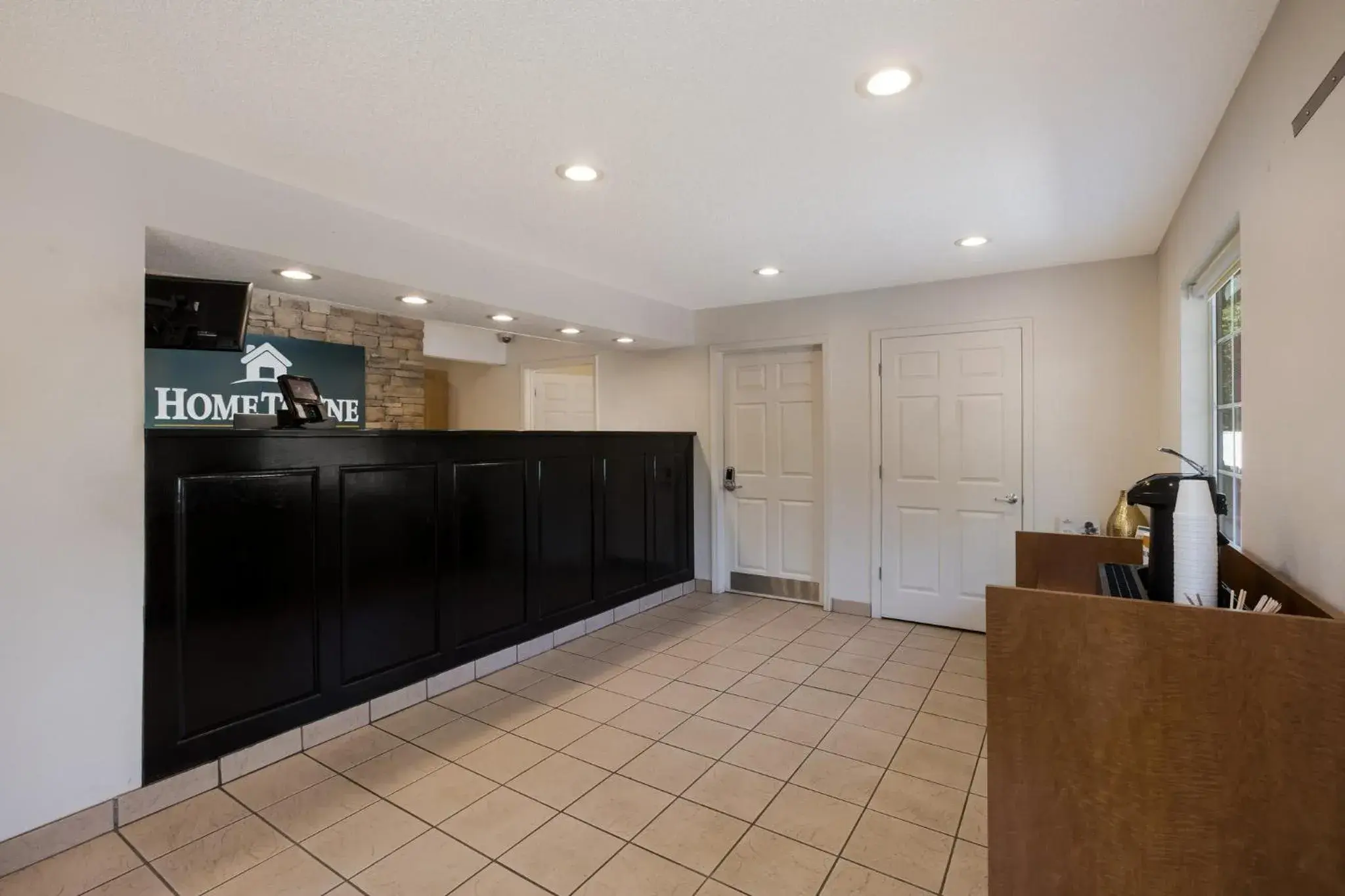 Lobby or reception in HomeTowne Studios by Red Roof Covington, GA Lobby or reception in HomeTowne Studios by Red Roof Covington, GA