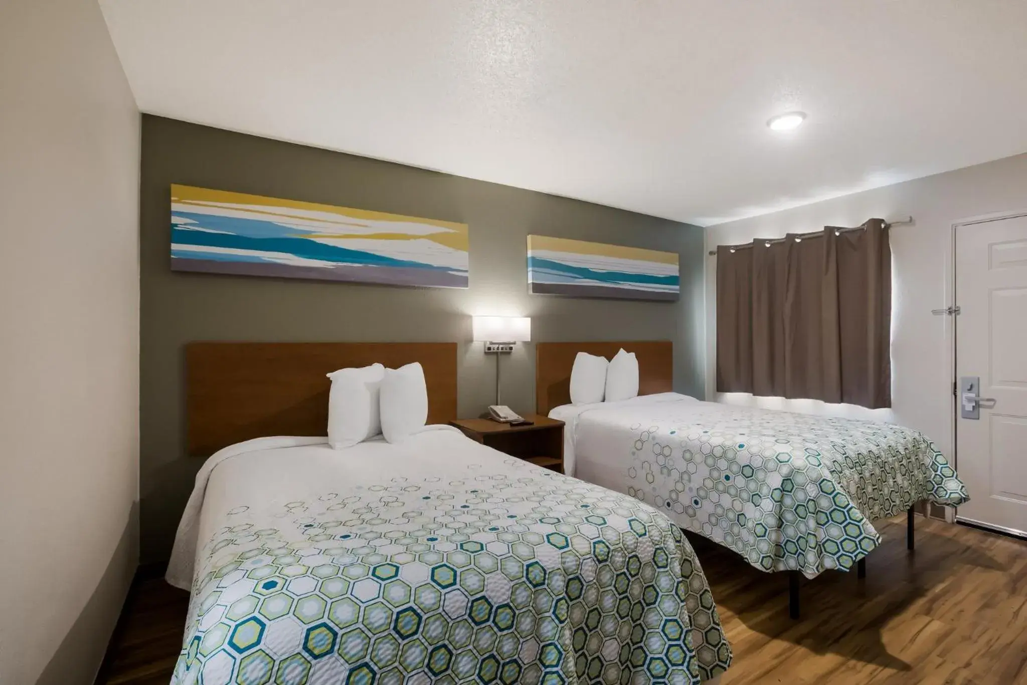 Photo of the whole room, Bed in HomeTowne Studios by Red Roof Covington, GA Photo of the whole room, Bed in HomeTowne Studios by Red Roof Covington, GA