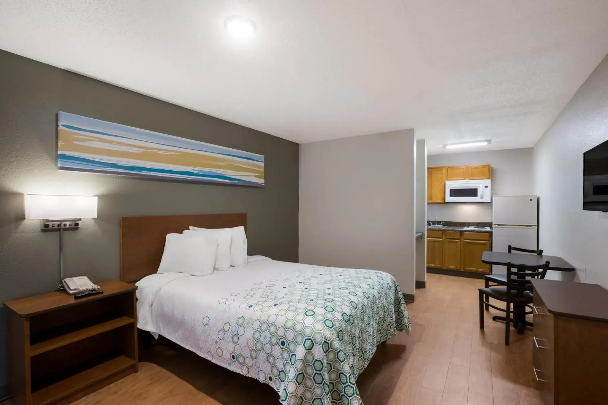 Bedroom, Bed in HomeTowne Studios by Red Roof Covington, GA Bedroom, Bed in HomeTowne Studios by Red Roof Covington, GA