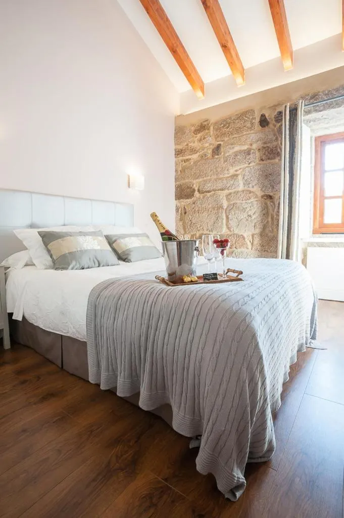 Property building, Bed in A Cantaruxa Maruxa Turismo Rural