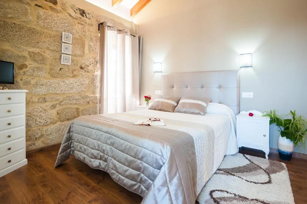 Property building, Bed in A Cantaruxa Maruxa Turismo Rural