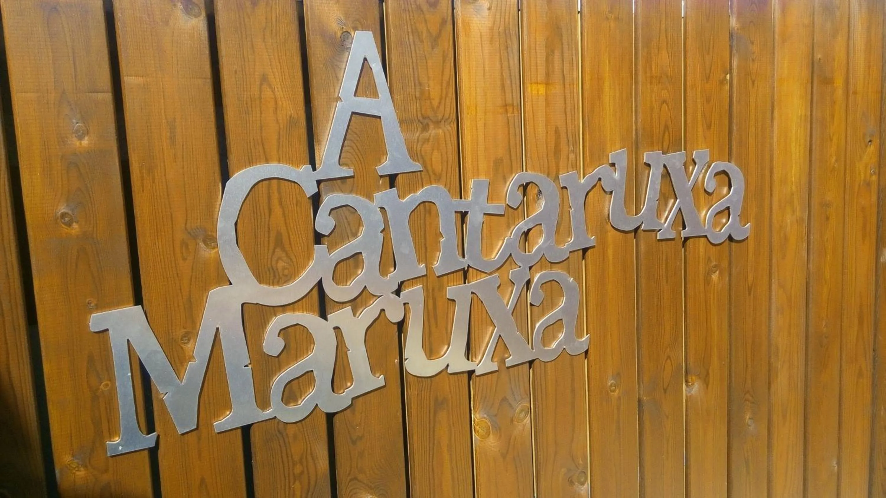 Property logo or sign in A Cantaruxa Maruxa Turismo Rural