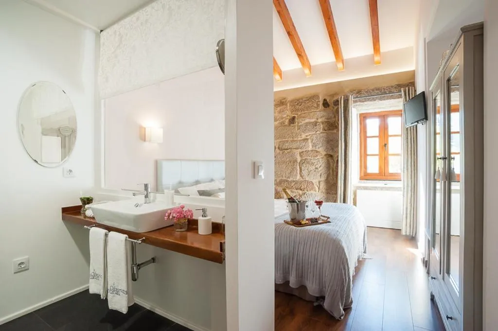 Property building, Bed in A Cantaruxa Maruxa Turismo Rural