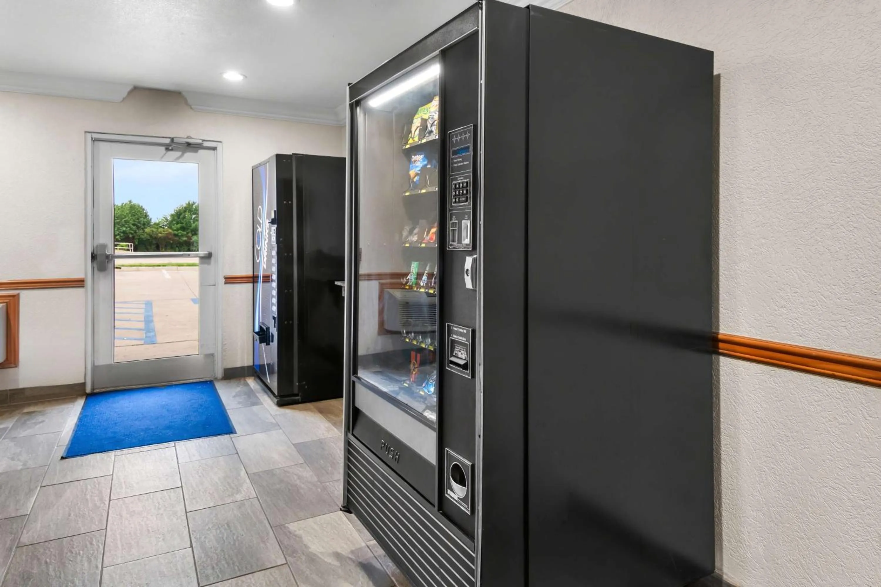 Property building in SureStay Plus by Best Western Fort Worth Benbrook