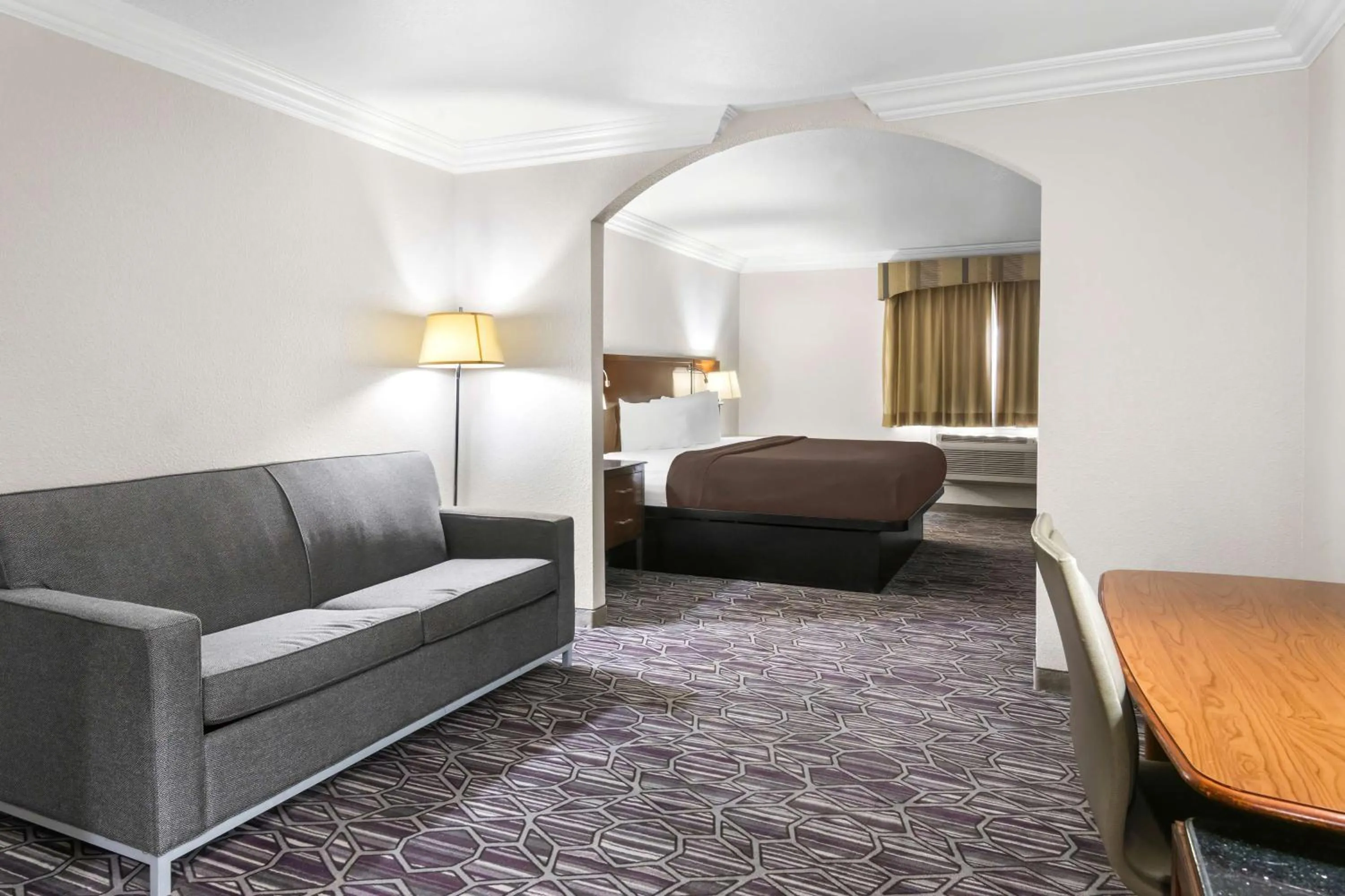 Bedroom in SureStay Plus by Best Western Fort Worth Benbrook