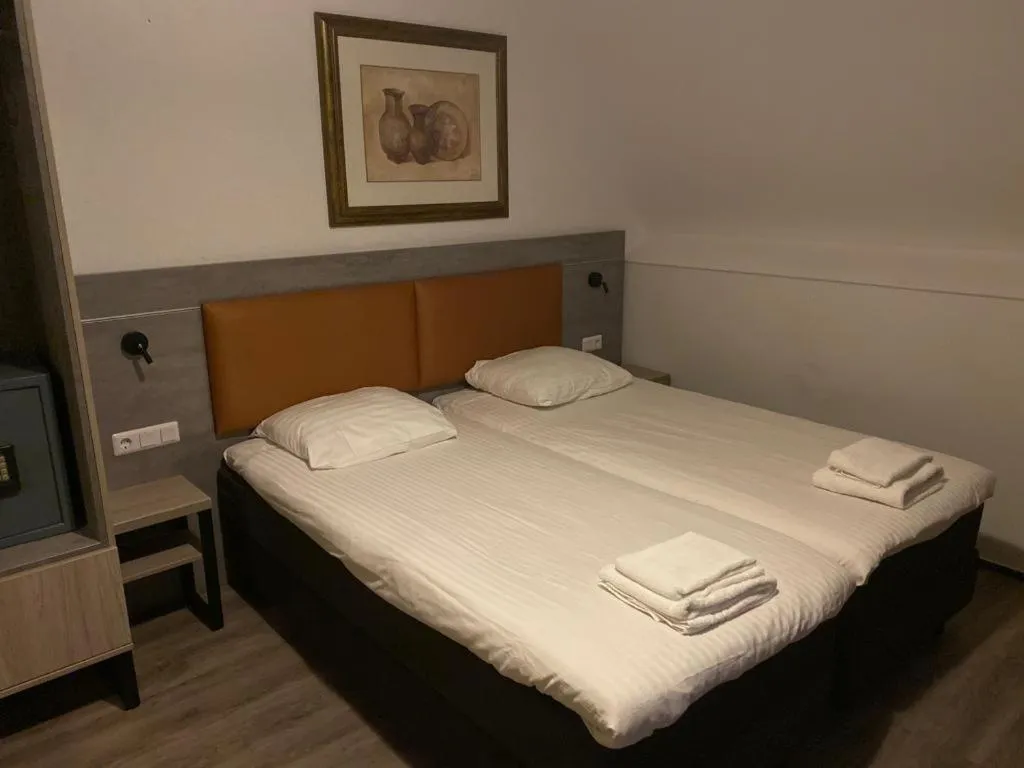 Bed in Hotel De Weyman