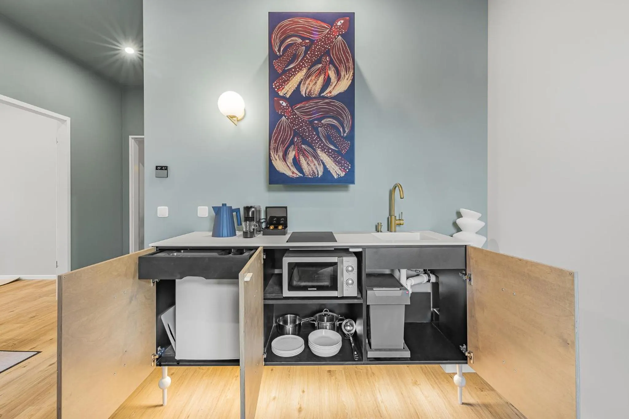 kitchen in kalm stay - a design Aparthotel