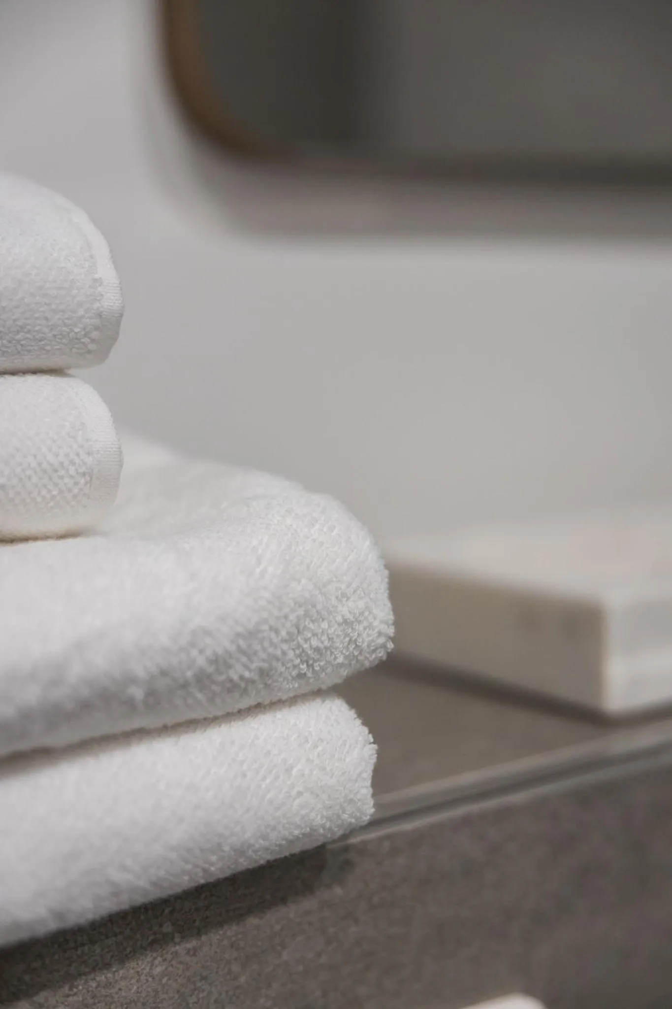 towels in kalm stay - a design Aparthotel