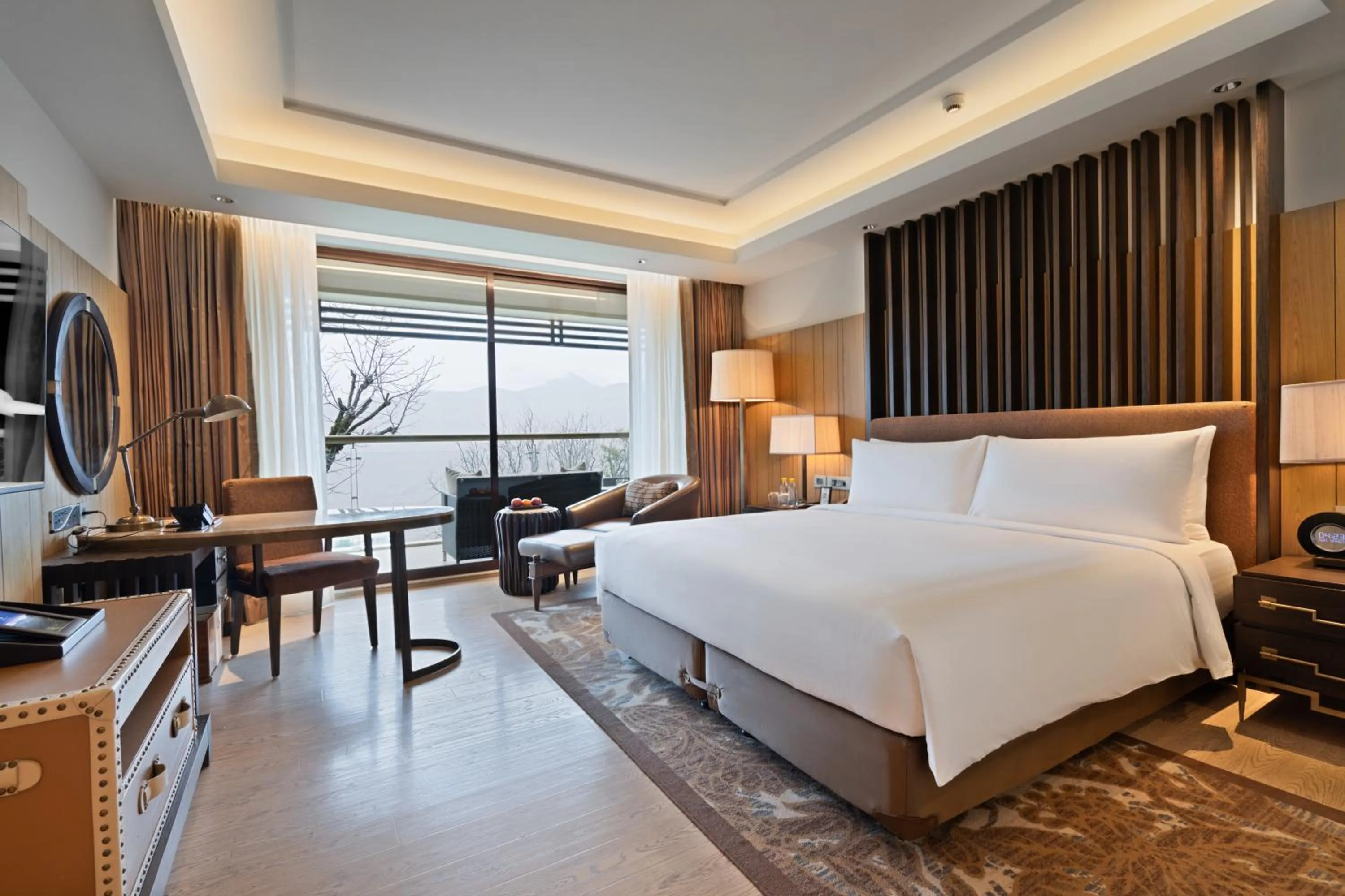 Bed in JW Marriott Mussoorie Walnut Grove Resort & Spa