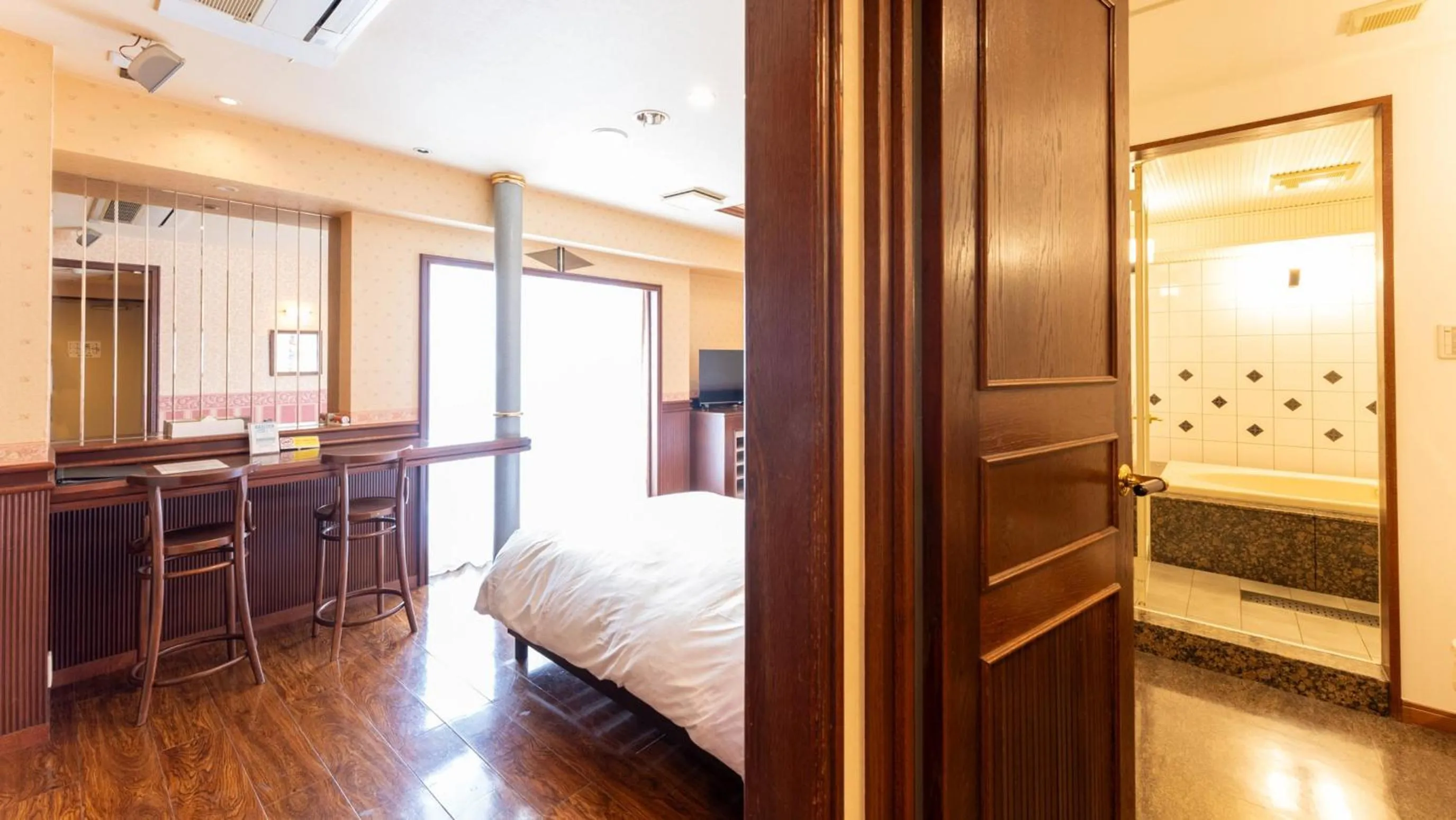 Bed in Tabist Shizukuishi Resort Hotel