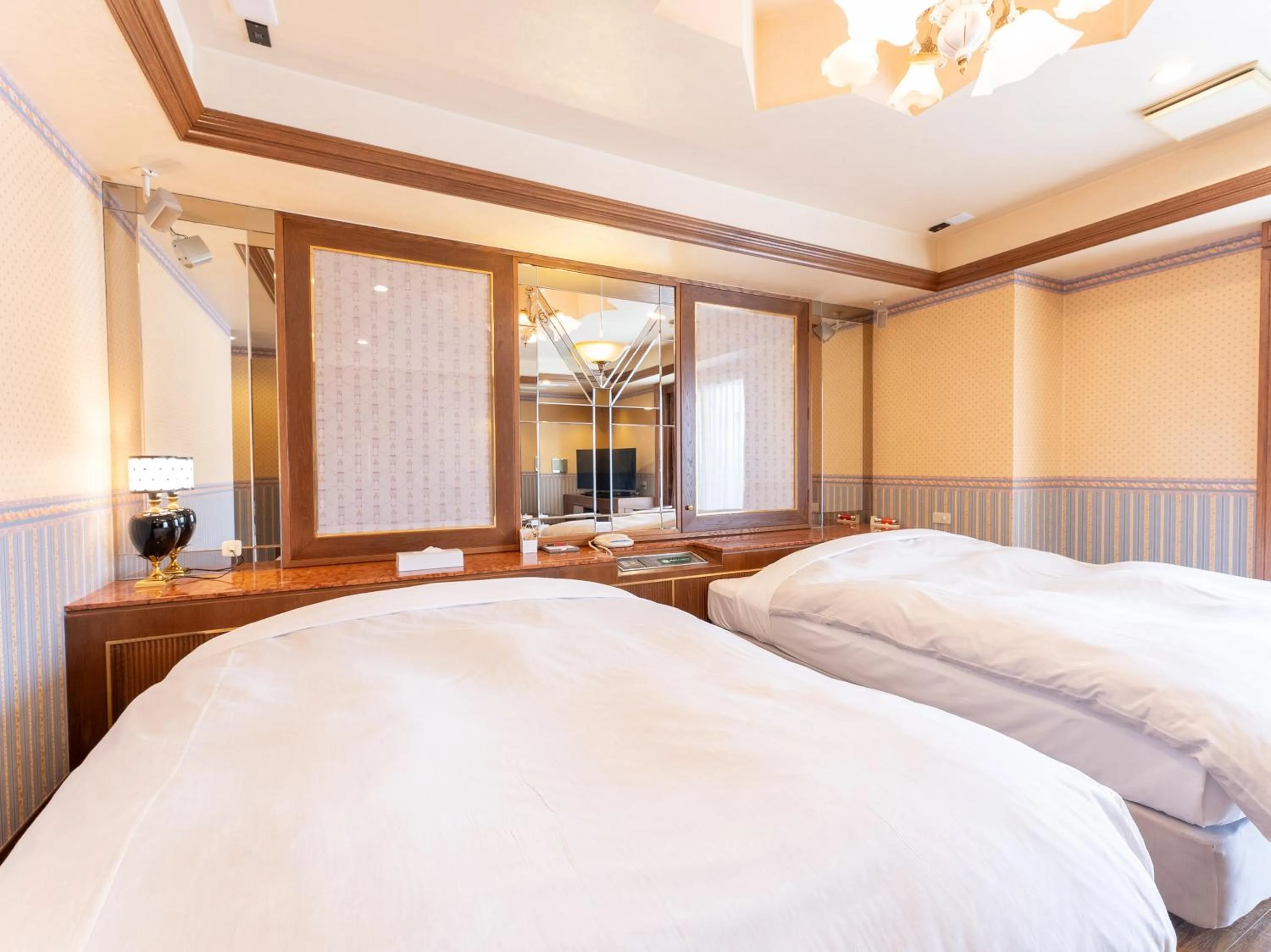 Bed in Tabist Shizukuishi Resort Hotel