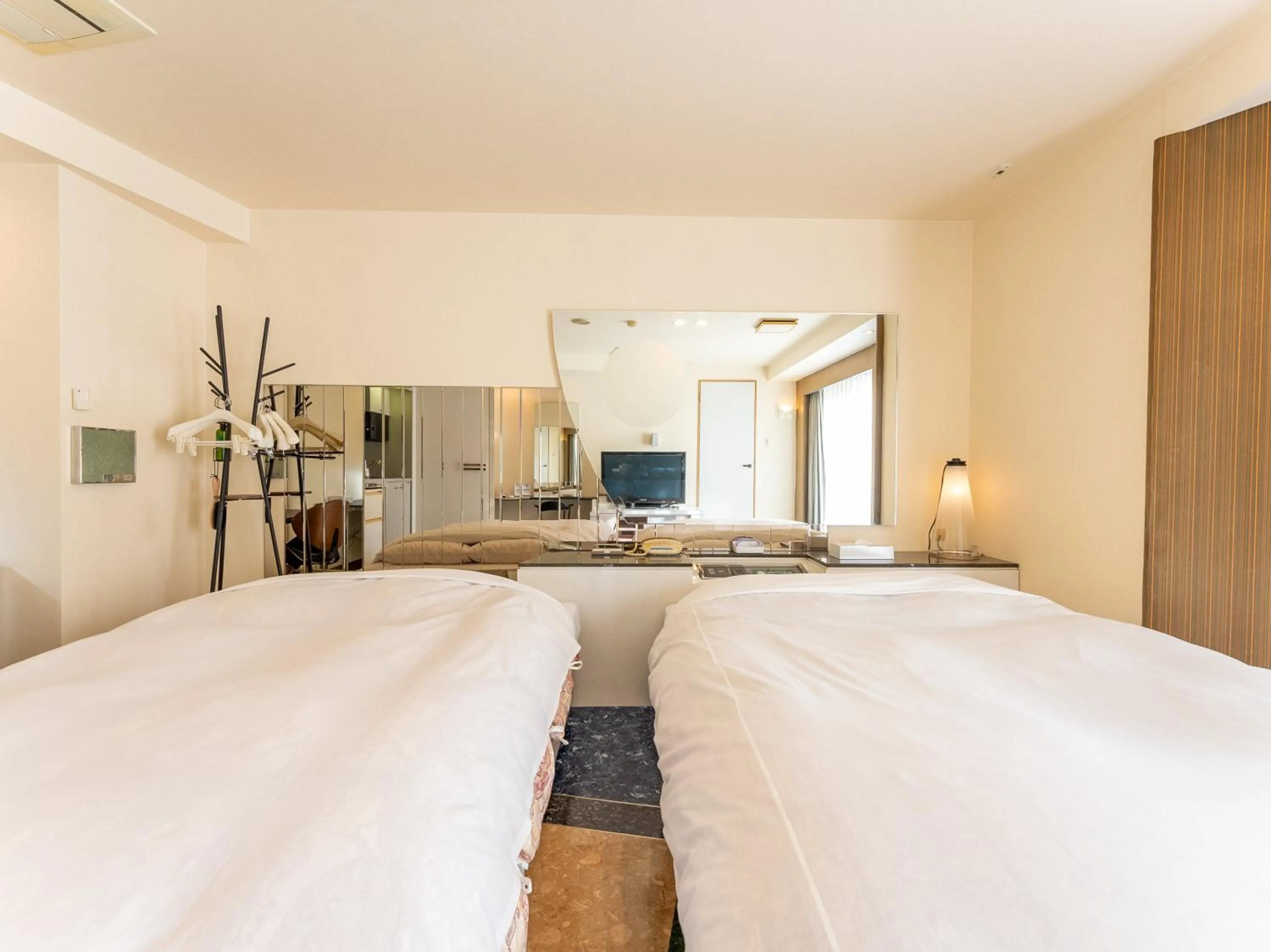 Bed in Tabist Shizukuishi Resort Hotel