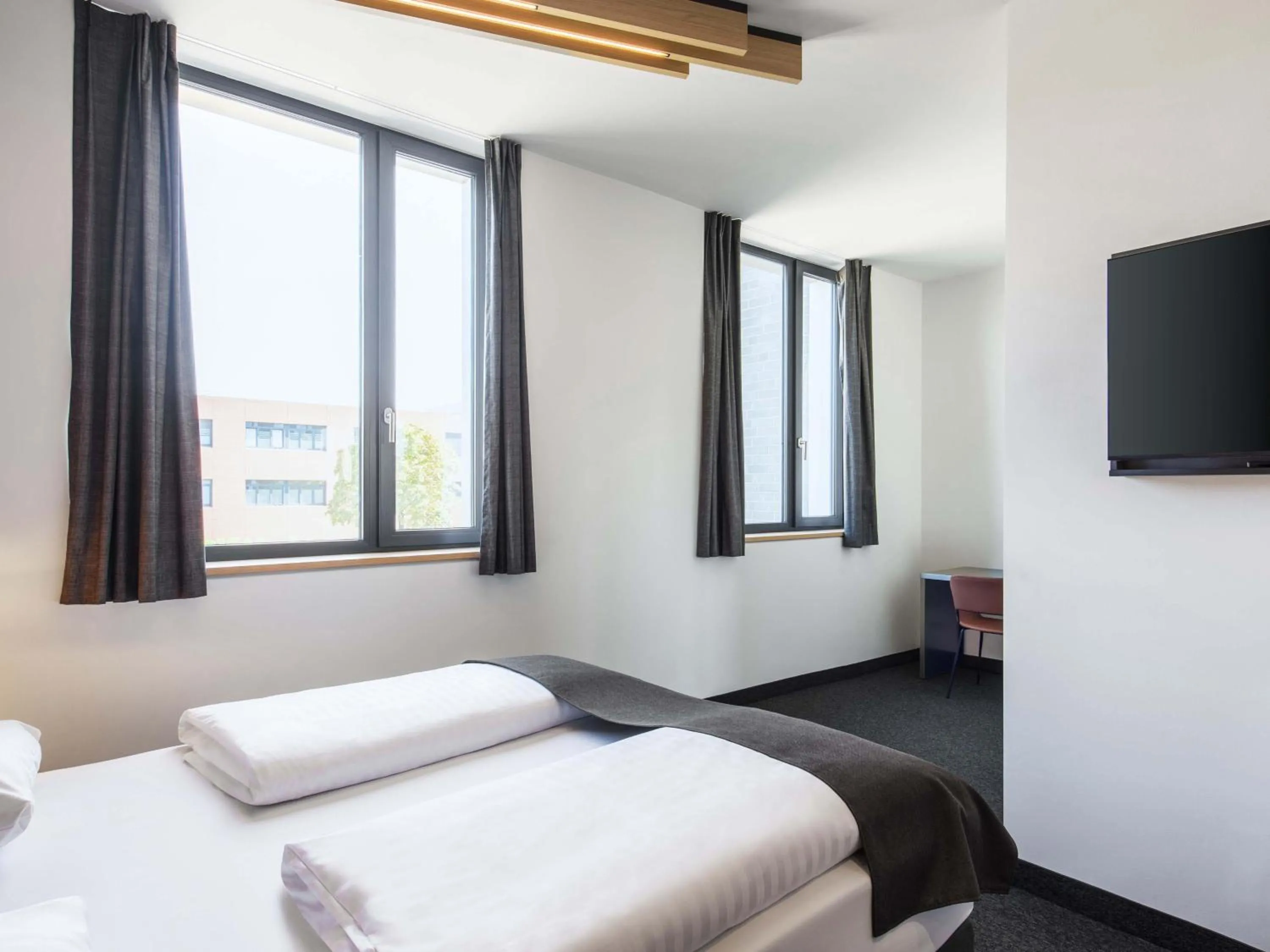 Photo of the whole room, Bed in B&B Hotel München-Trudering