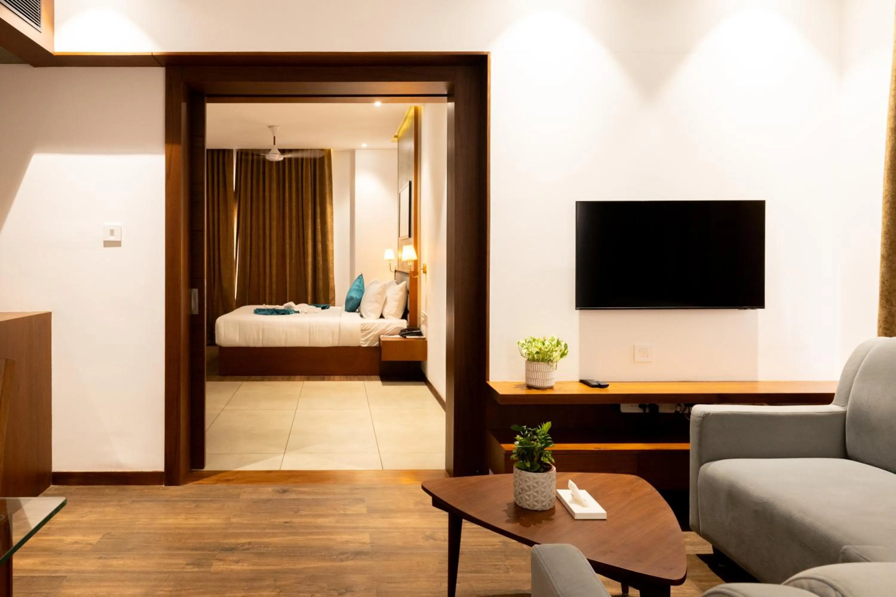 Living room, Bed in Gokulam Park Guruvayur