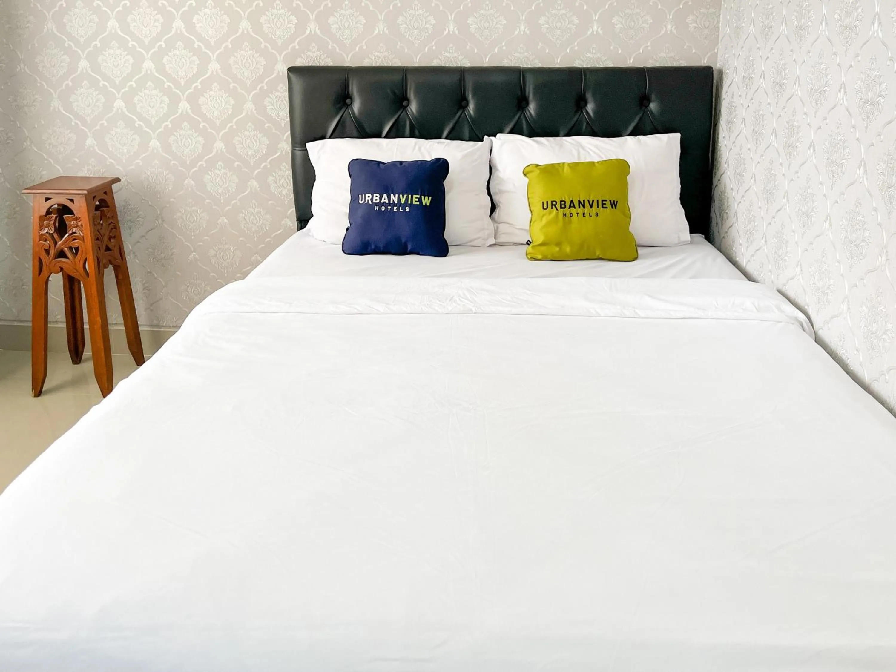 Bed in Urbanview Syariah Hotel Kanigara Batu