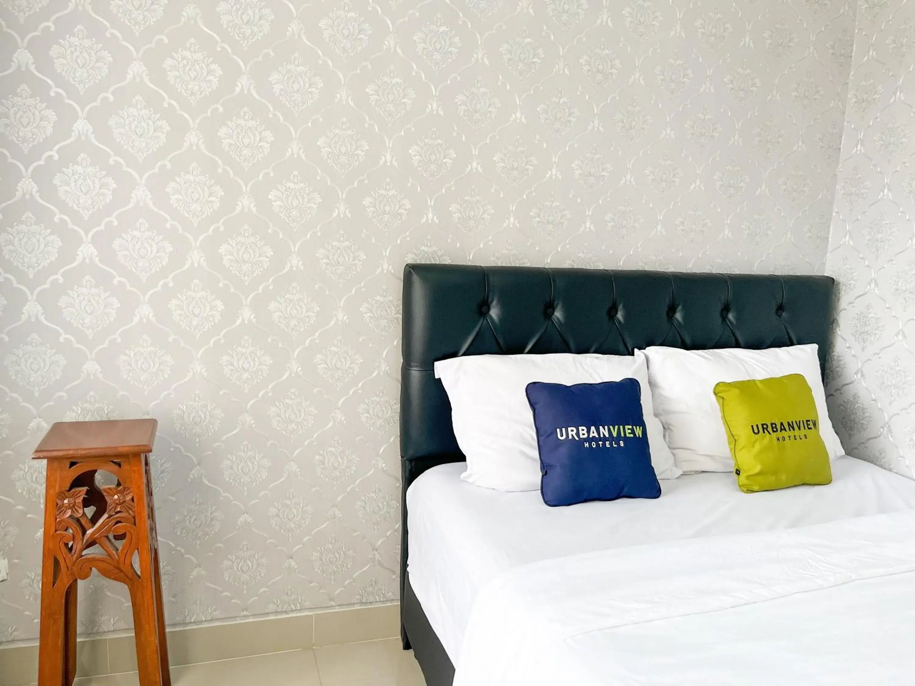 Bed in Urbanview Syariah Hotel Kanigara Batu Bed in Urbanview Syariah Hotel Kanigara Batu