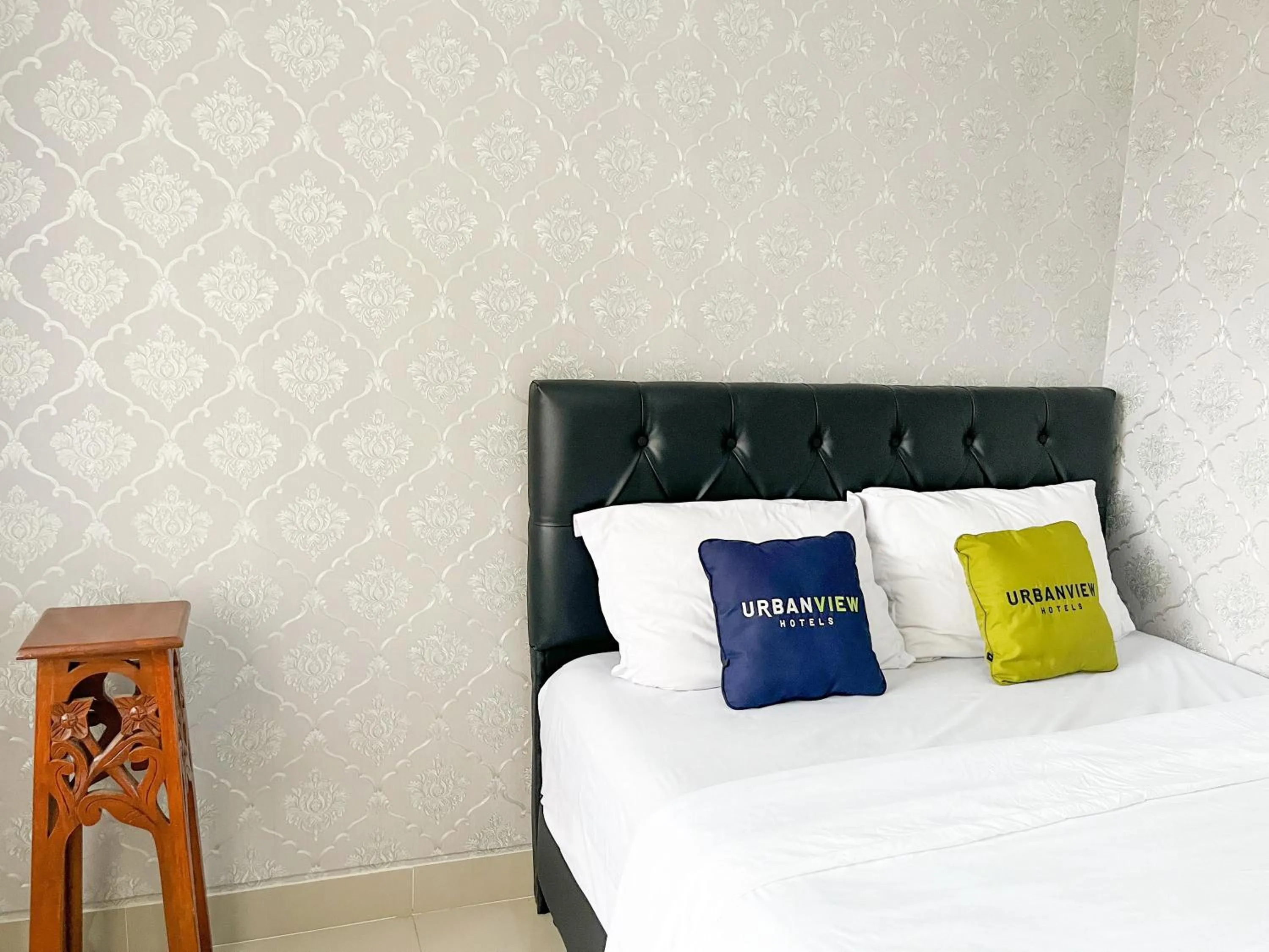 Bed in Urbanview Syariah Hotel Kanigara Batu