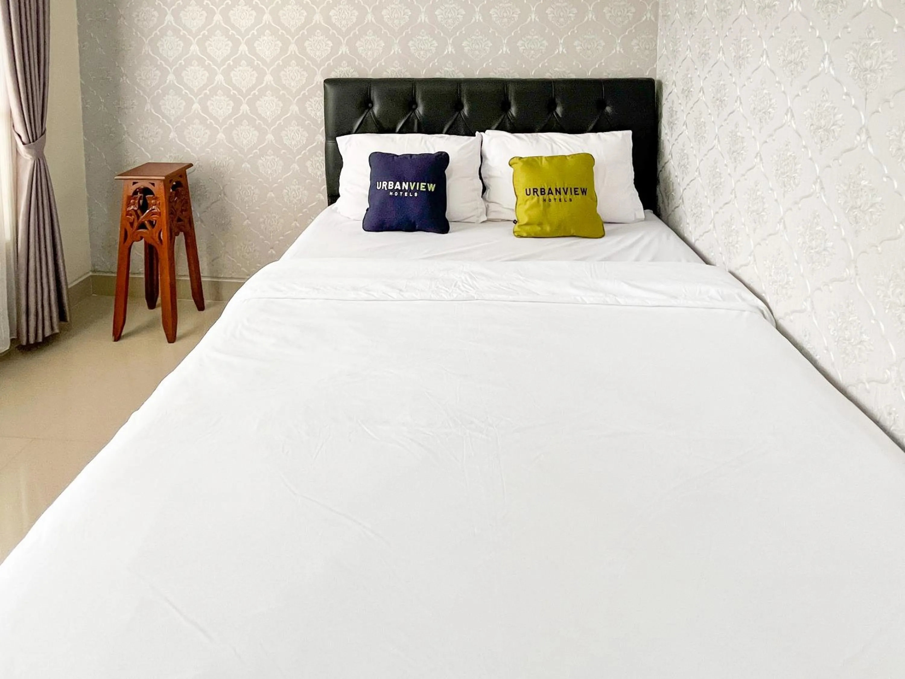 Bed in Urbanview Syariah Hotel Kanigara Batu