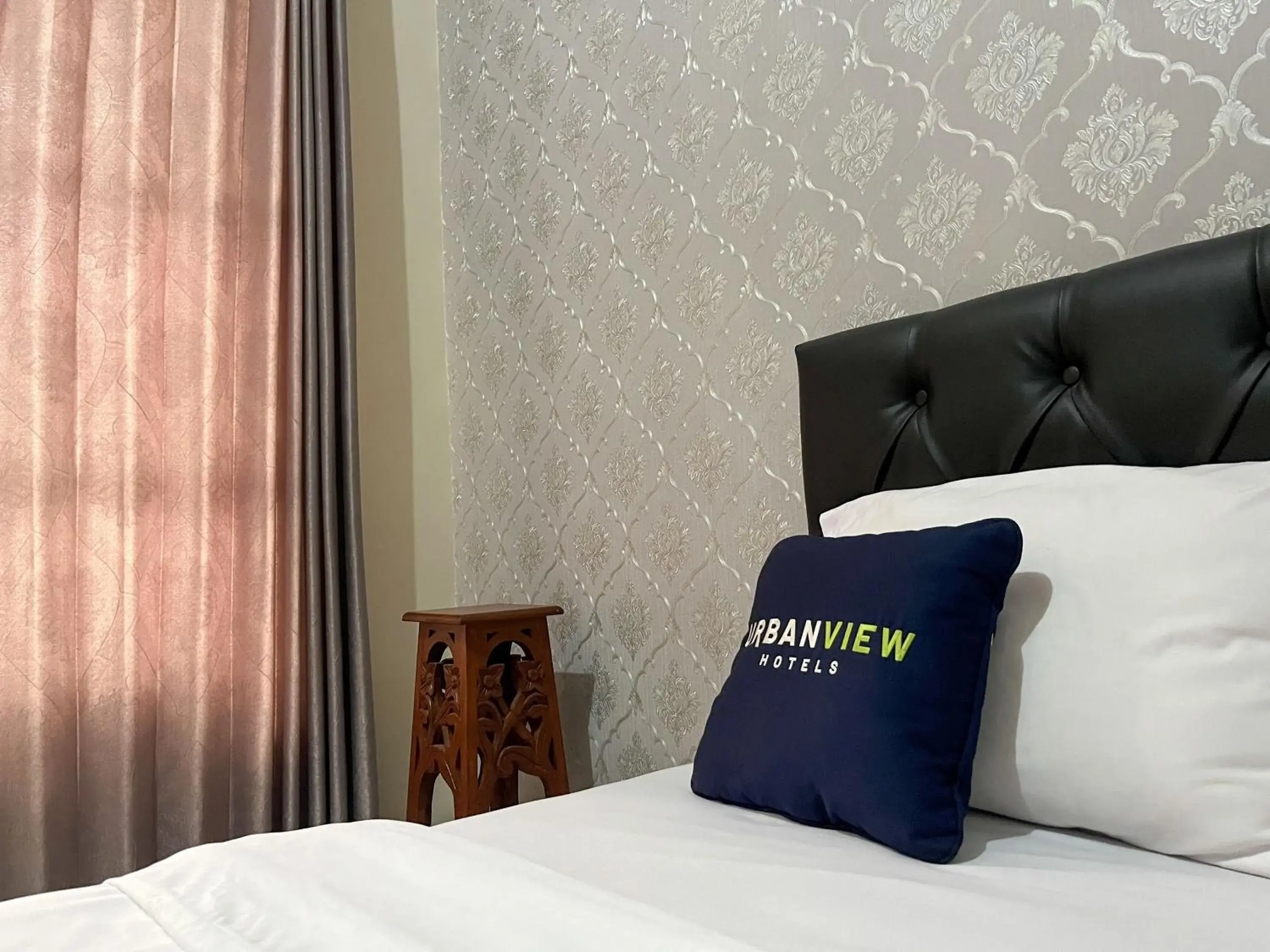 Bed in Urbanview Syariah Hotel Kanigara Batu Bed in Urbanview Syariah Hotel Kanigara Batu