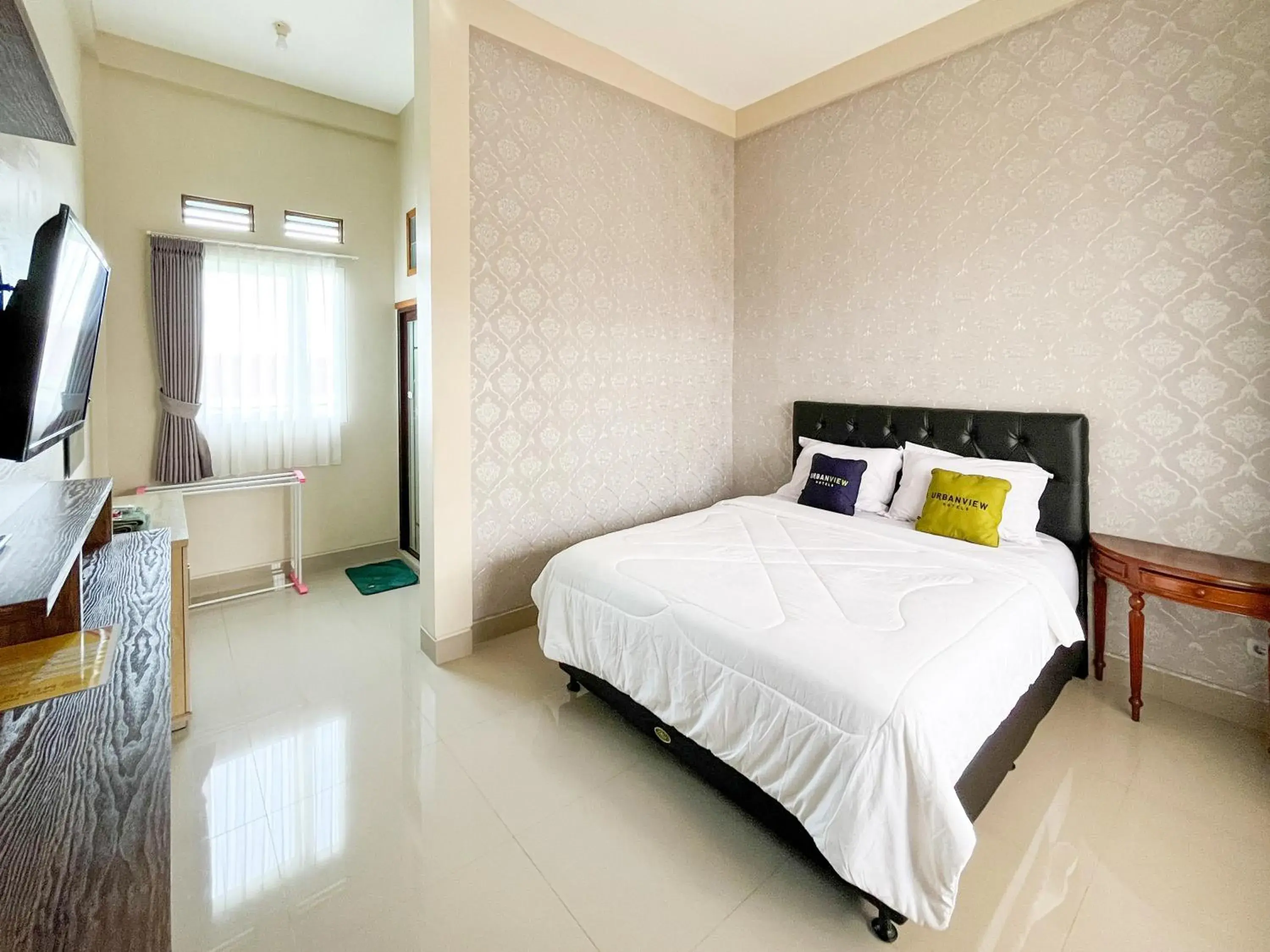 Bed in Urbanview Syariah Hotel Kanigara Batu Bed in Urbanview Syariah Hotel Kanigara Batu