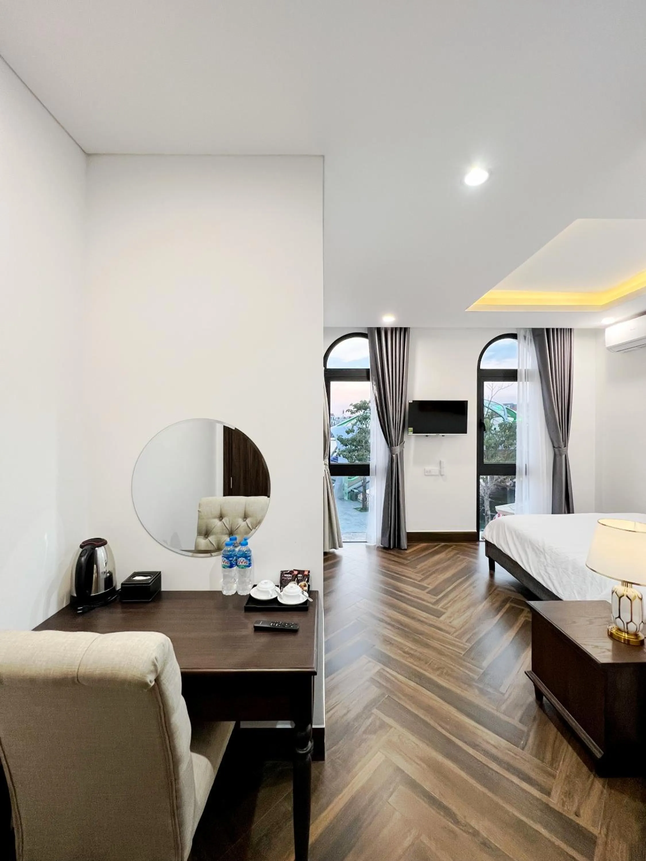 Living room, Bed in Legacy Hotel - Grand World Phú Quốc