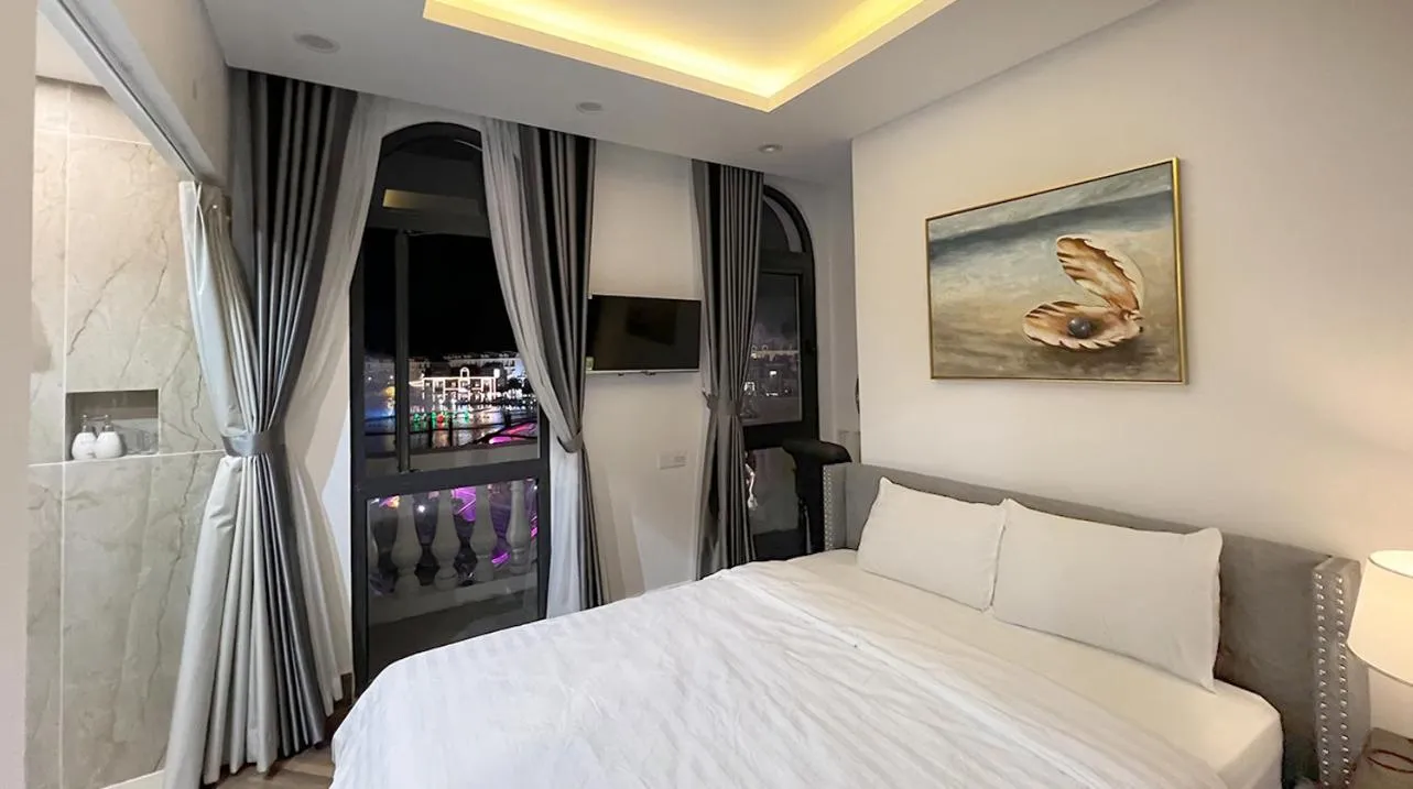 Photo of the whole room, Bed in Legacy Hotel - Grand World Phú Quốc