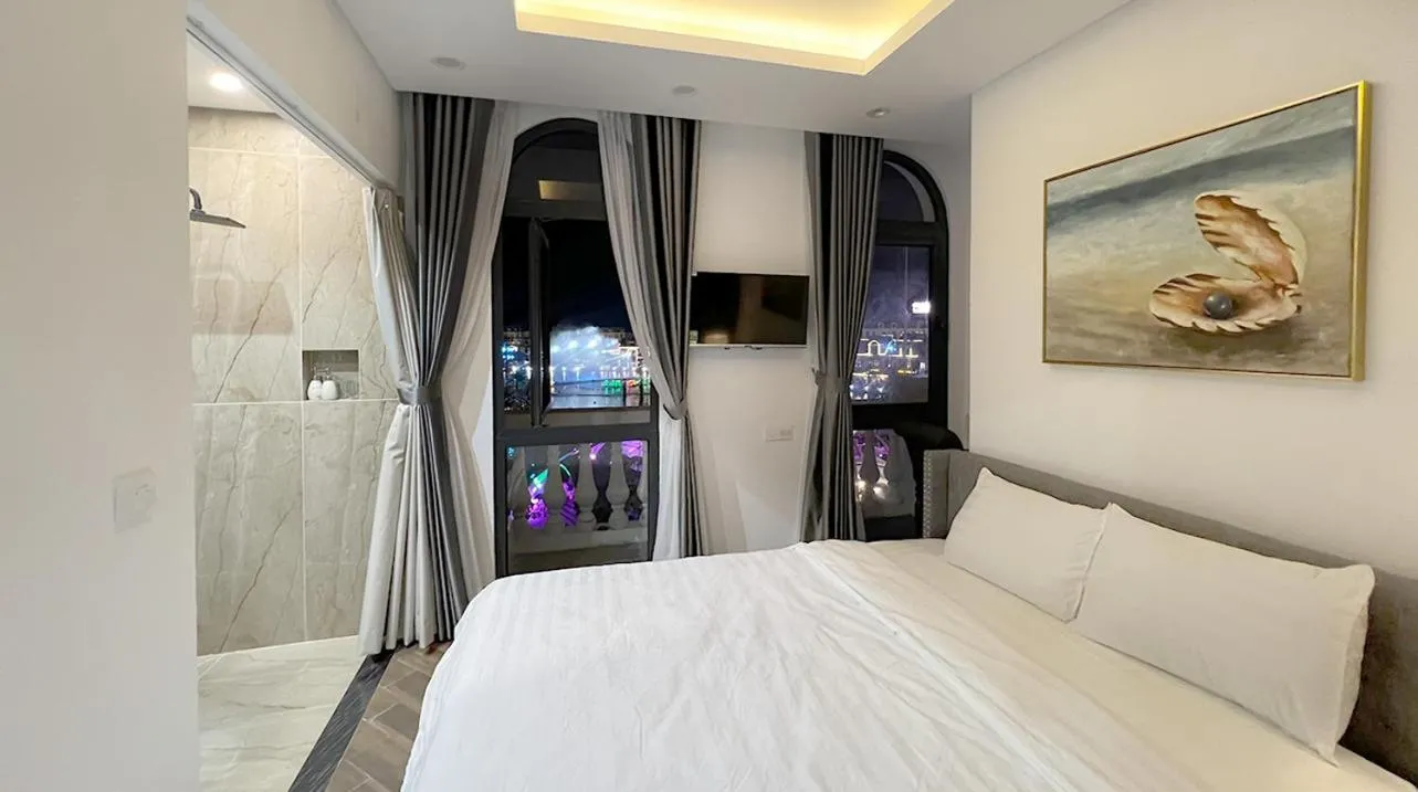 Photo of the whole room, Bed in Legacy Hotel - Grand World Phú Quốc