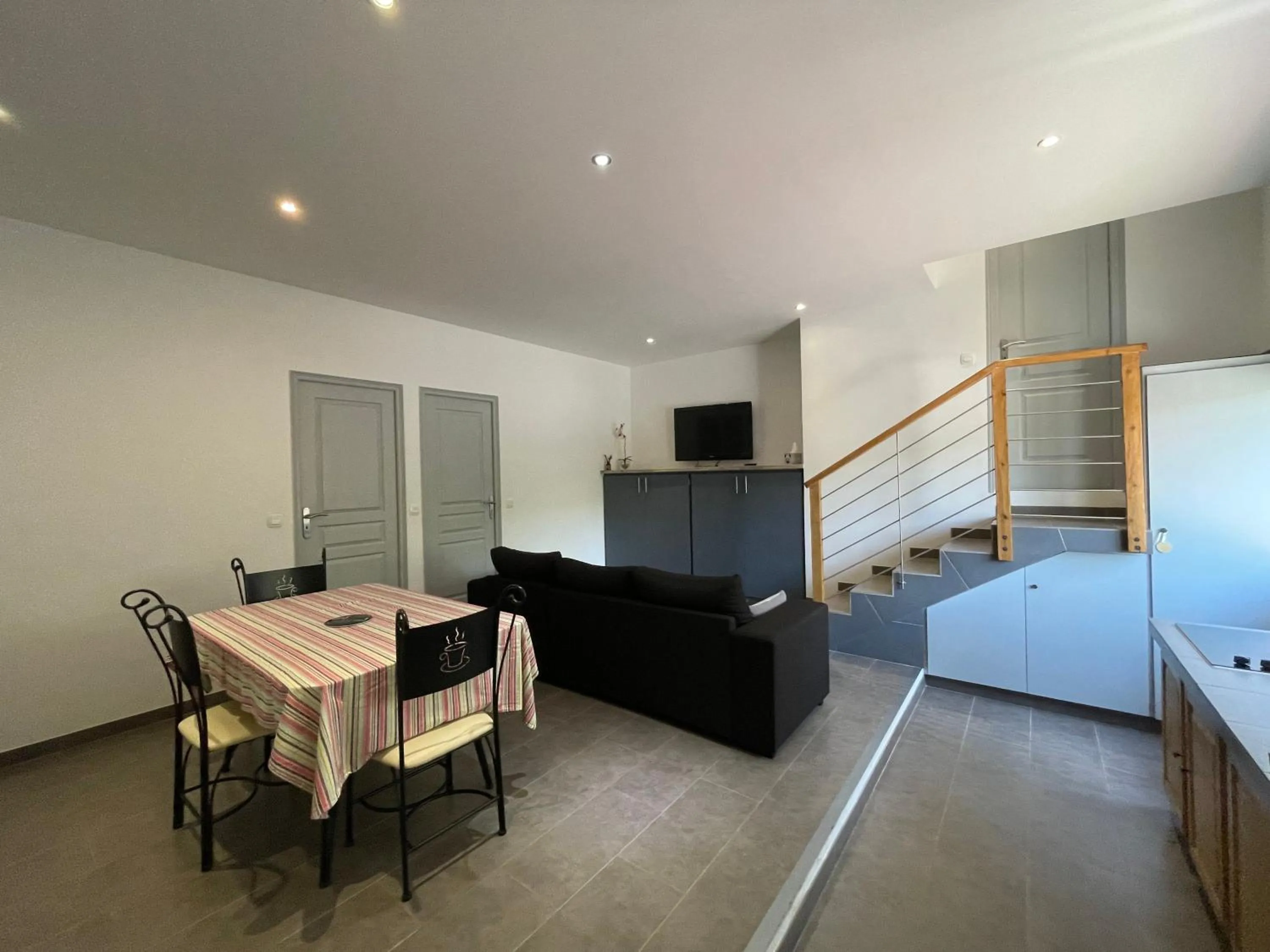 Communal lounge/ TV room in Holiday Home l'Angelet