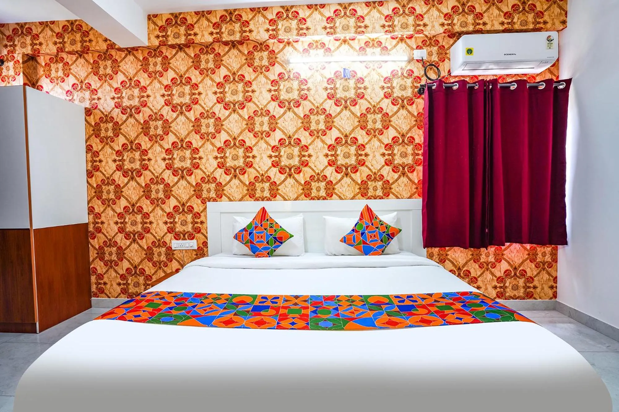 Bed in FabHotel Royal Platinum Suites