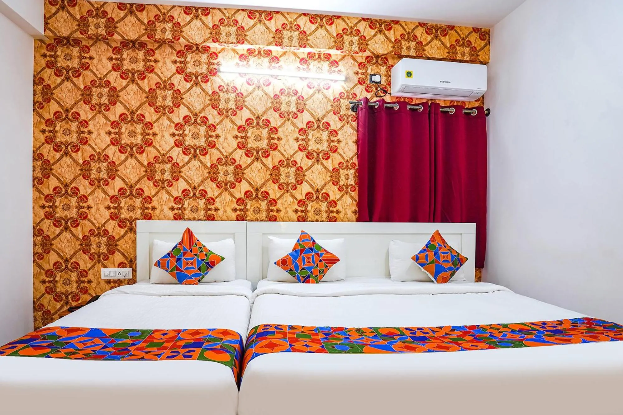 Bed in FabHotel Royal Platinum Suites