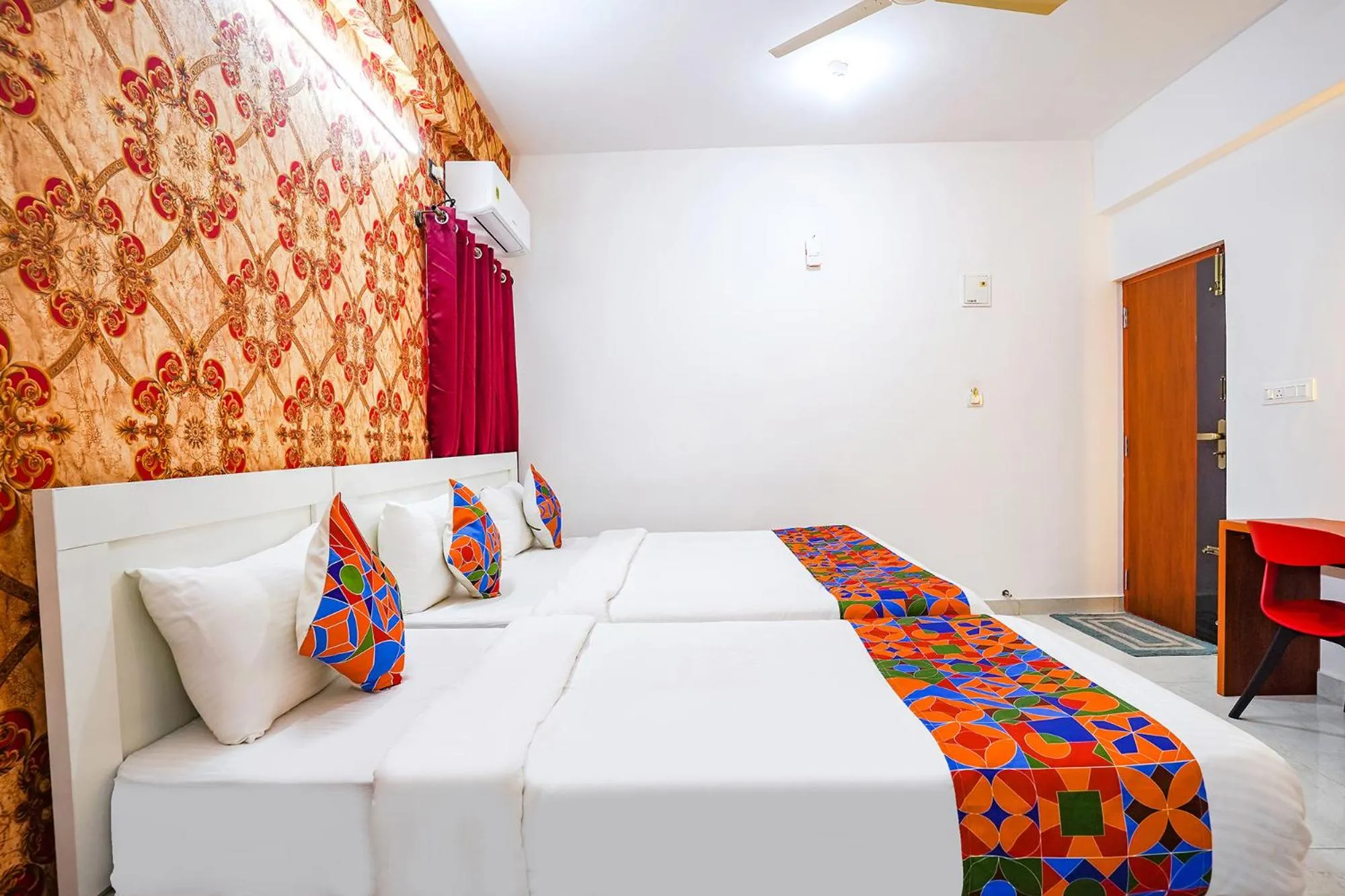 Bed in FabHotel Royal Platinum Suites