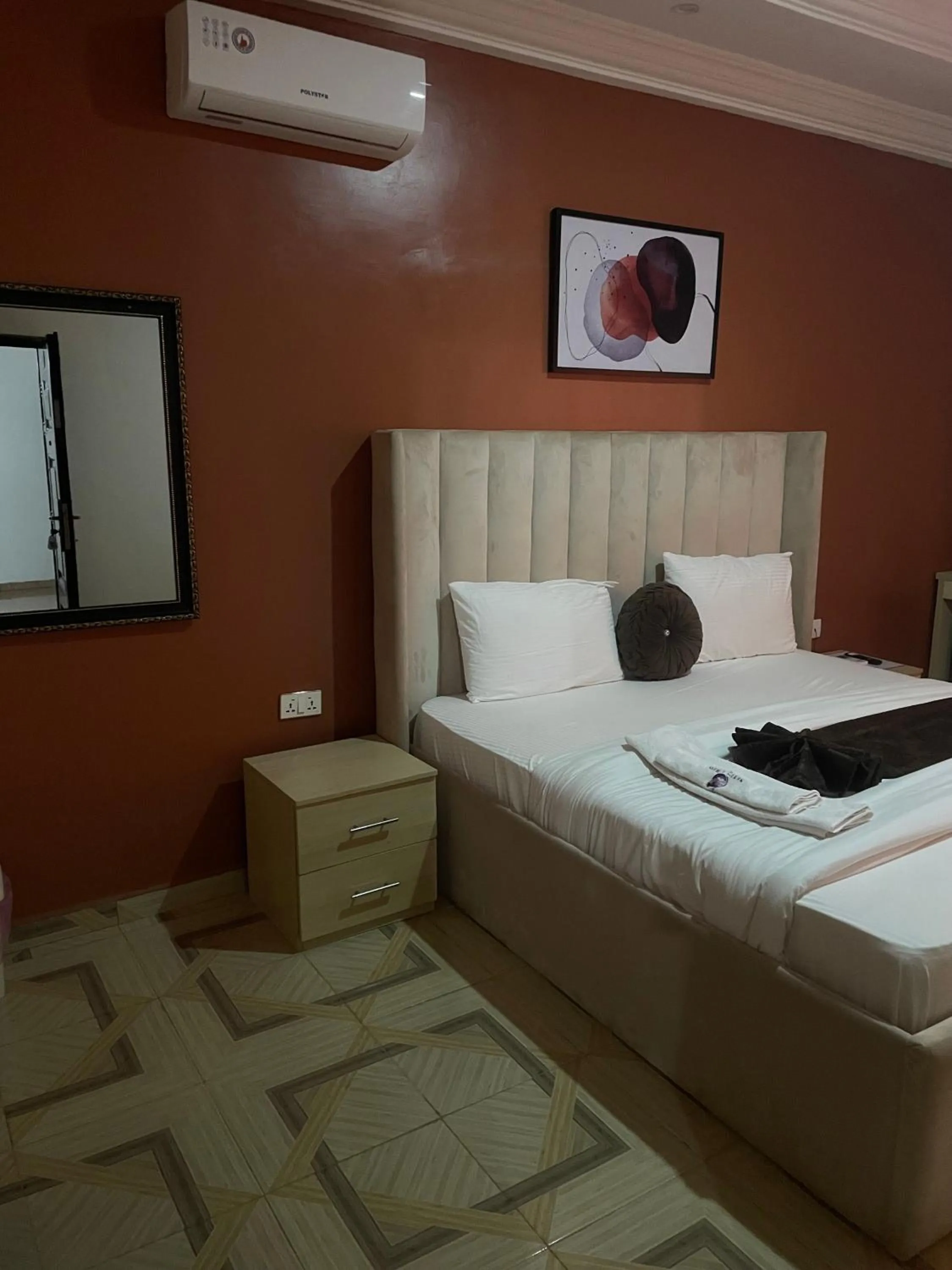Bed in Nexus Xpress Hotel