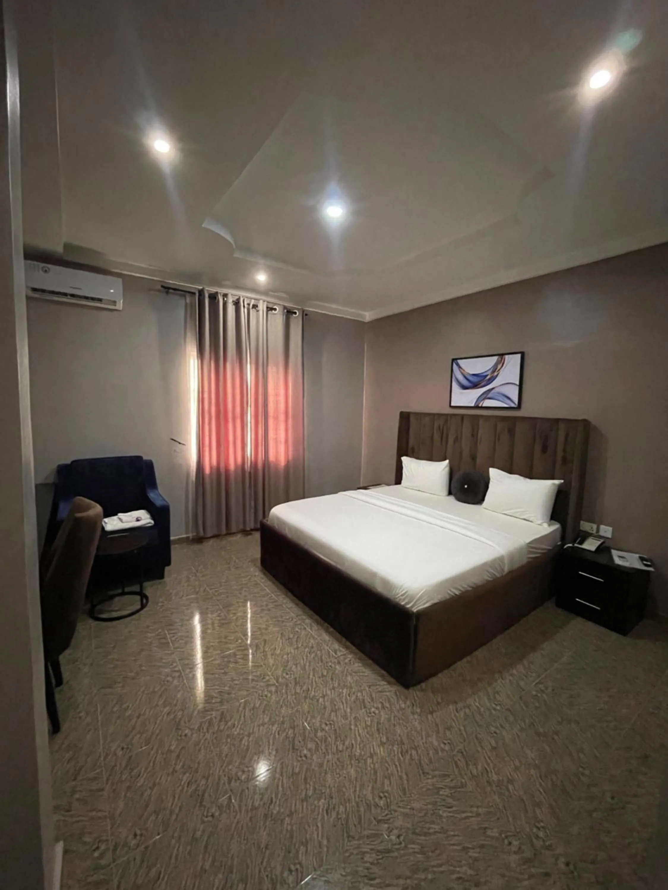 Bed in Nexus Xpress Hotel
