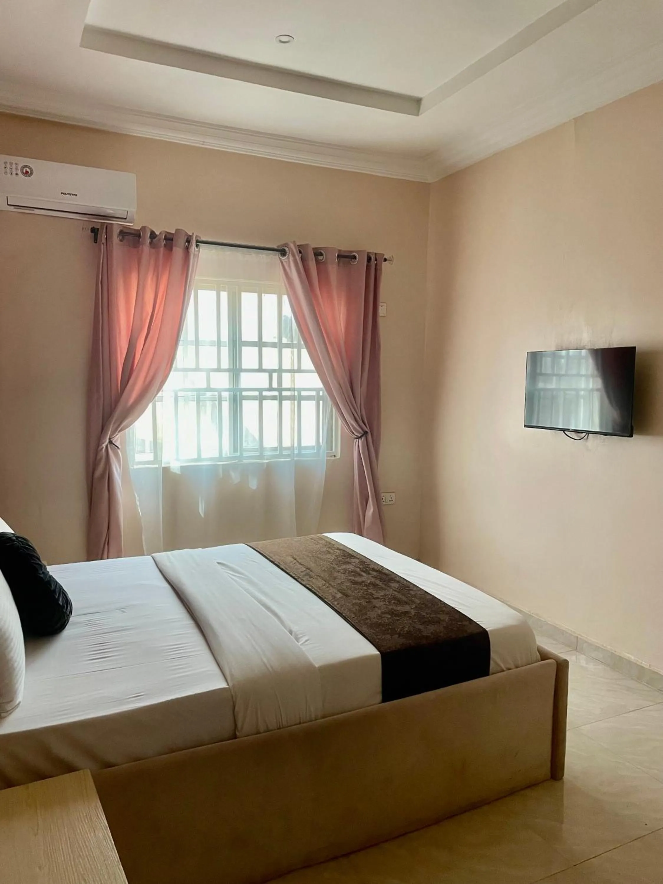 Bed in Nexus Xpress Hotel