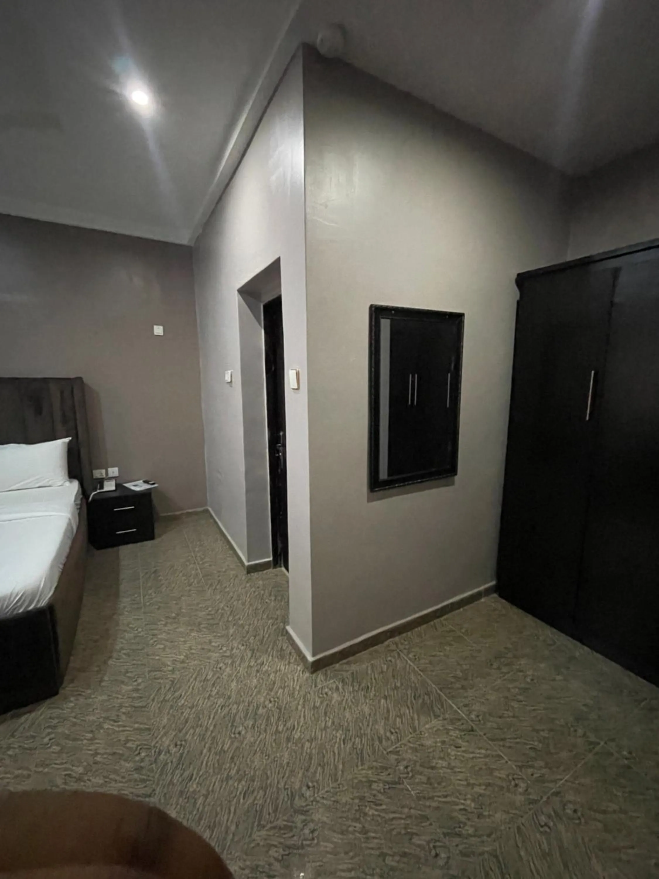 Bed in Nexus Xpress Hotel
