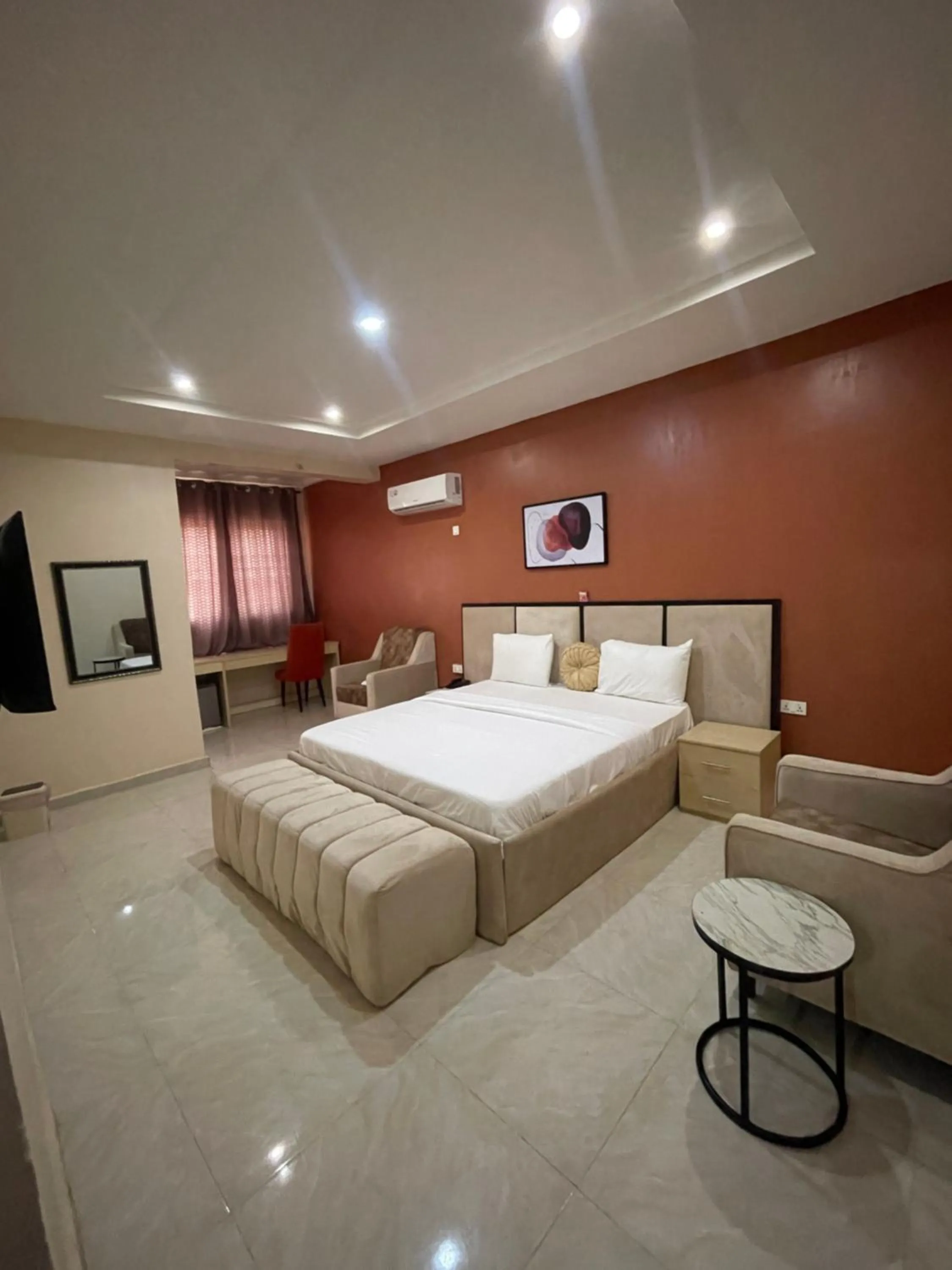 Bed in Nexus Xpress Hotel