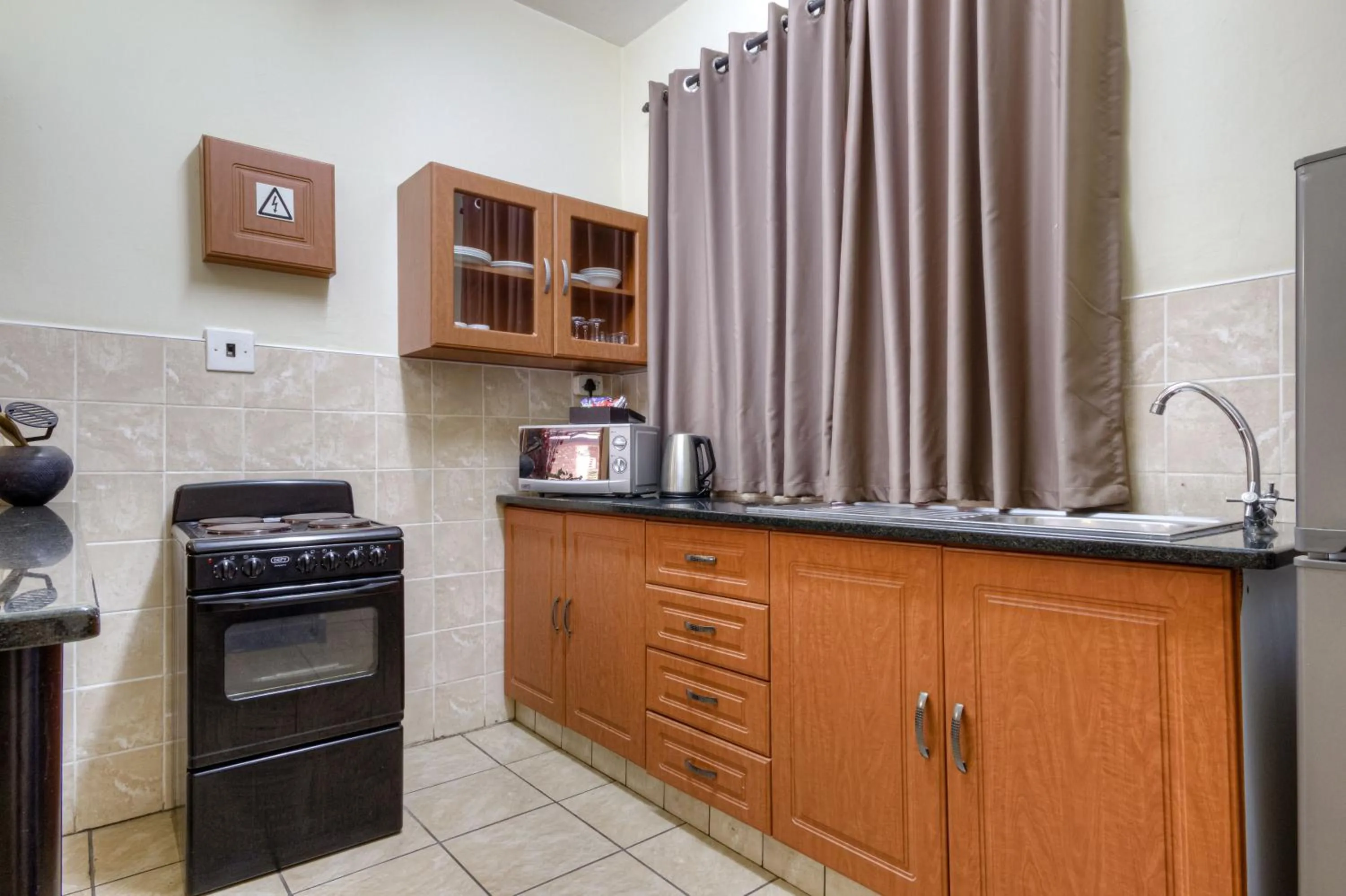 Kitchen or kitchenette in Shonalanga Lodge