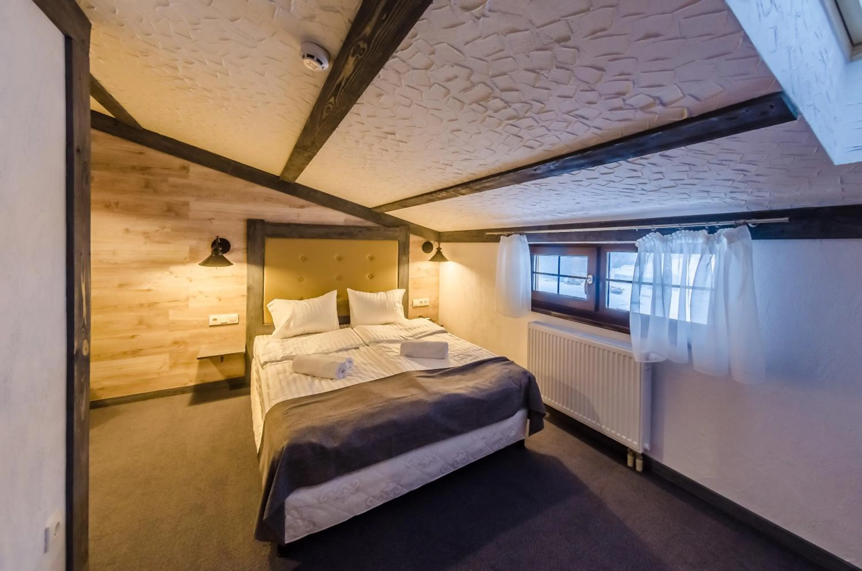 Photo of the whole room, Bed in Chalet CrepDeChine Hotel