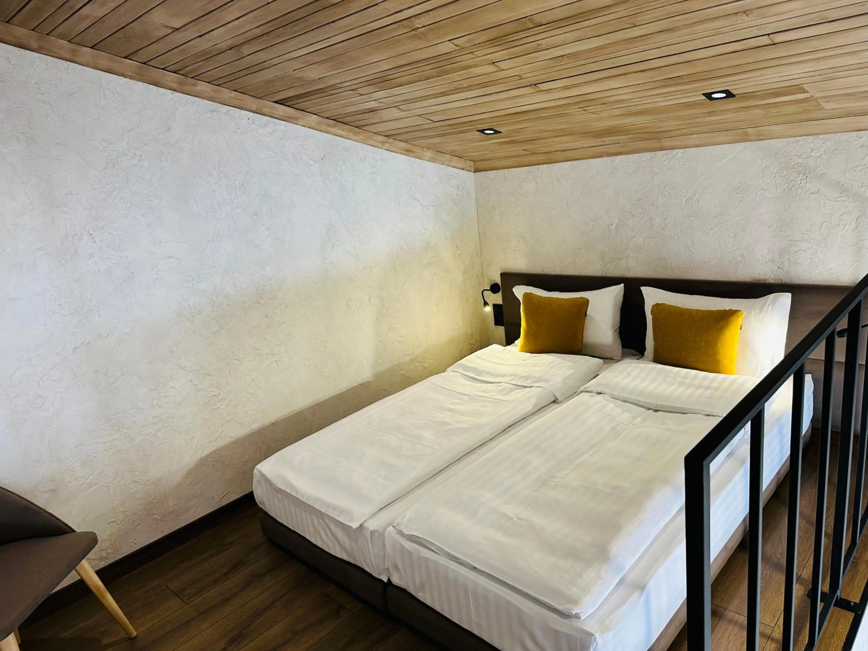Bed in Chalet CrepDeChine Hotel
