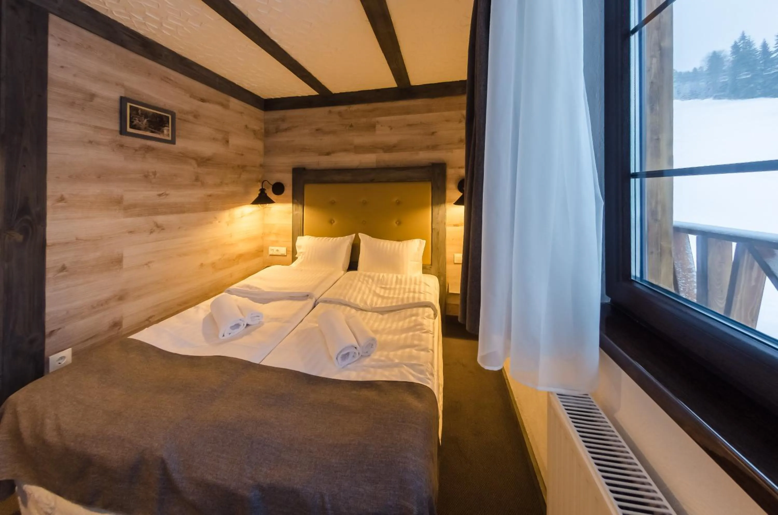 Photo of the whole room, Bed in Chalet CrepDeChine Hotel