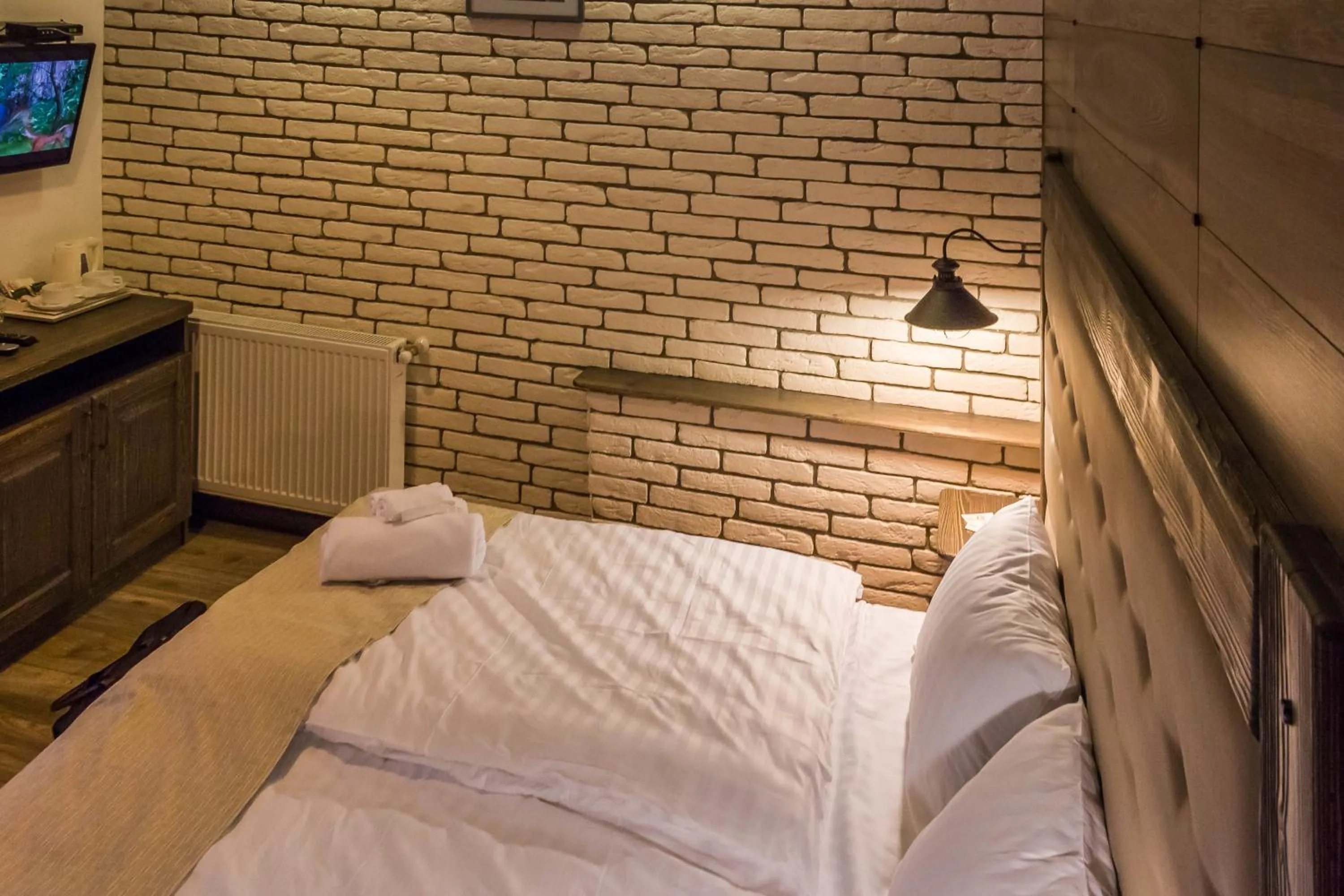 Photo of the whole room, Bed in Chalet CrepDeChine Hotel
