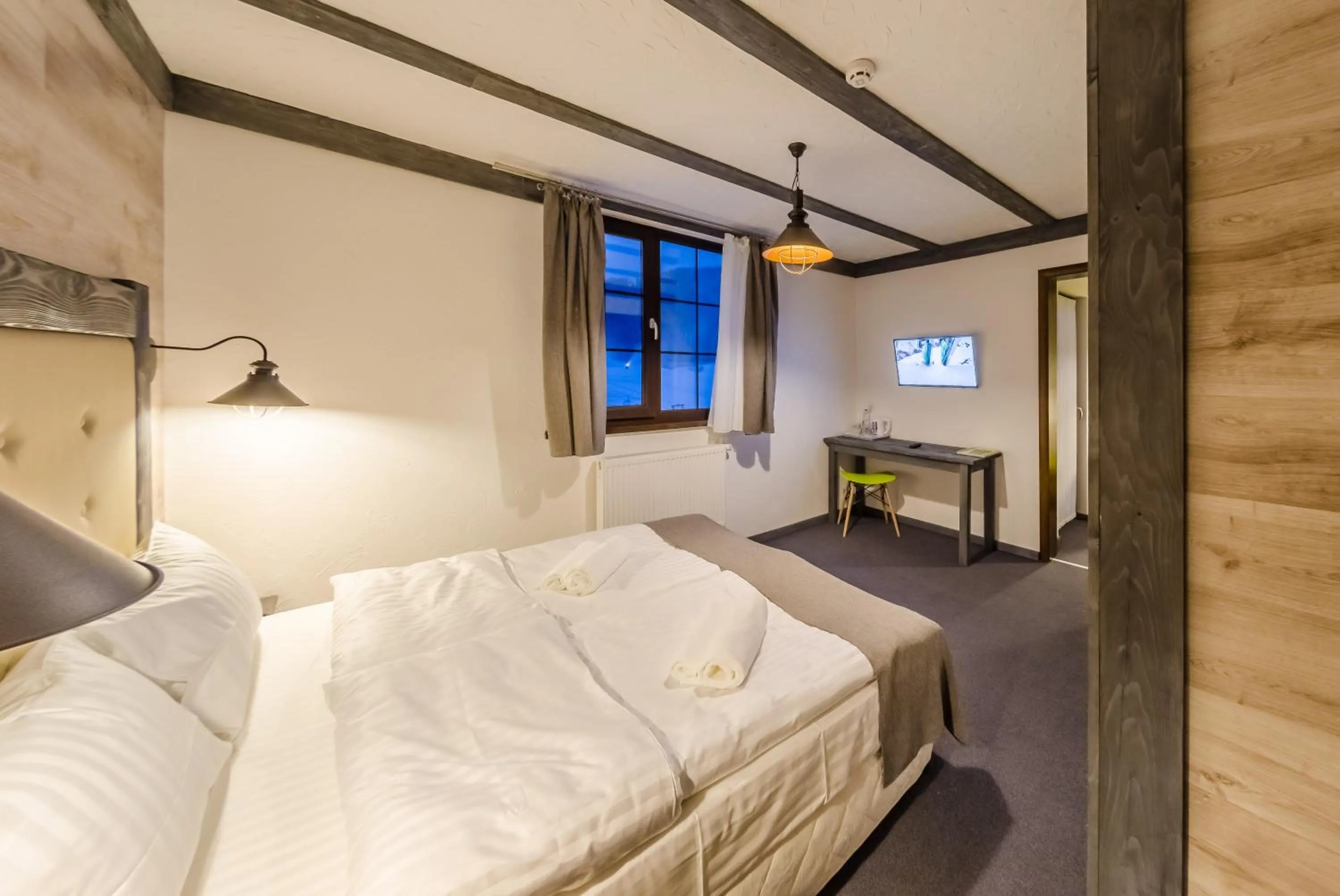 Photo of the whole room, Bed in Chalet CrepDeChine Hotel